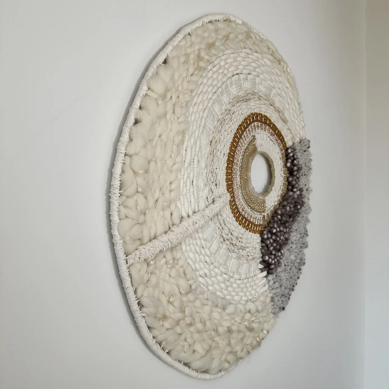 picture of round handwoven wallart wallpiece wallhanging wool and cotton modern weaving