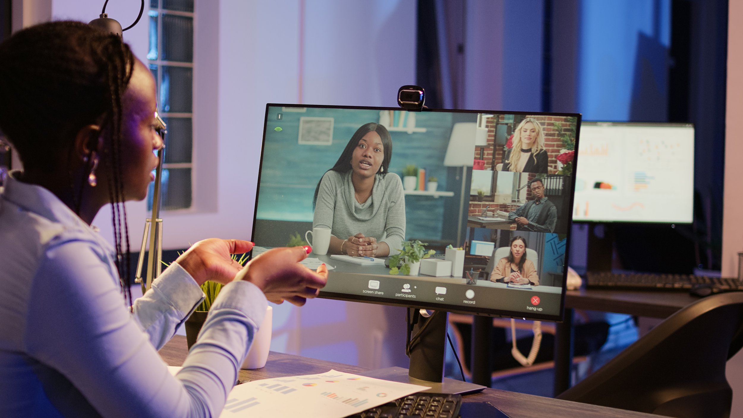 photodune-mypwQuN4-business-woman-meeting-with-colleagues-on-online-videocall-xxl.jpg