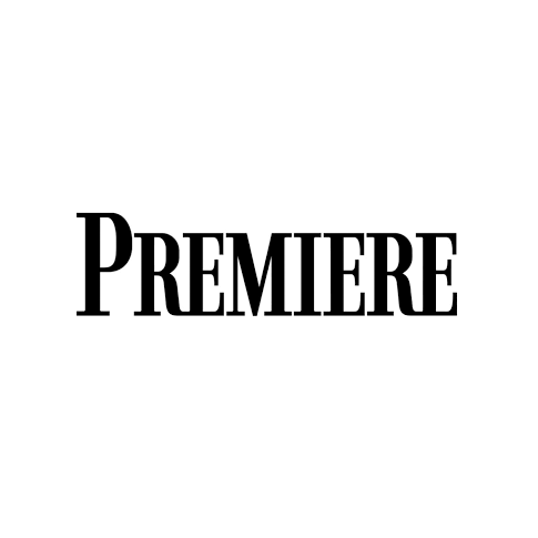 The word 'PREMIERE' in bold black letters on a white background.