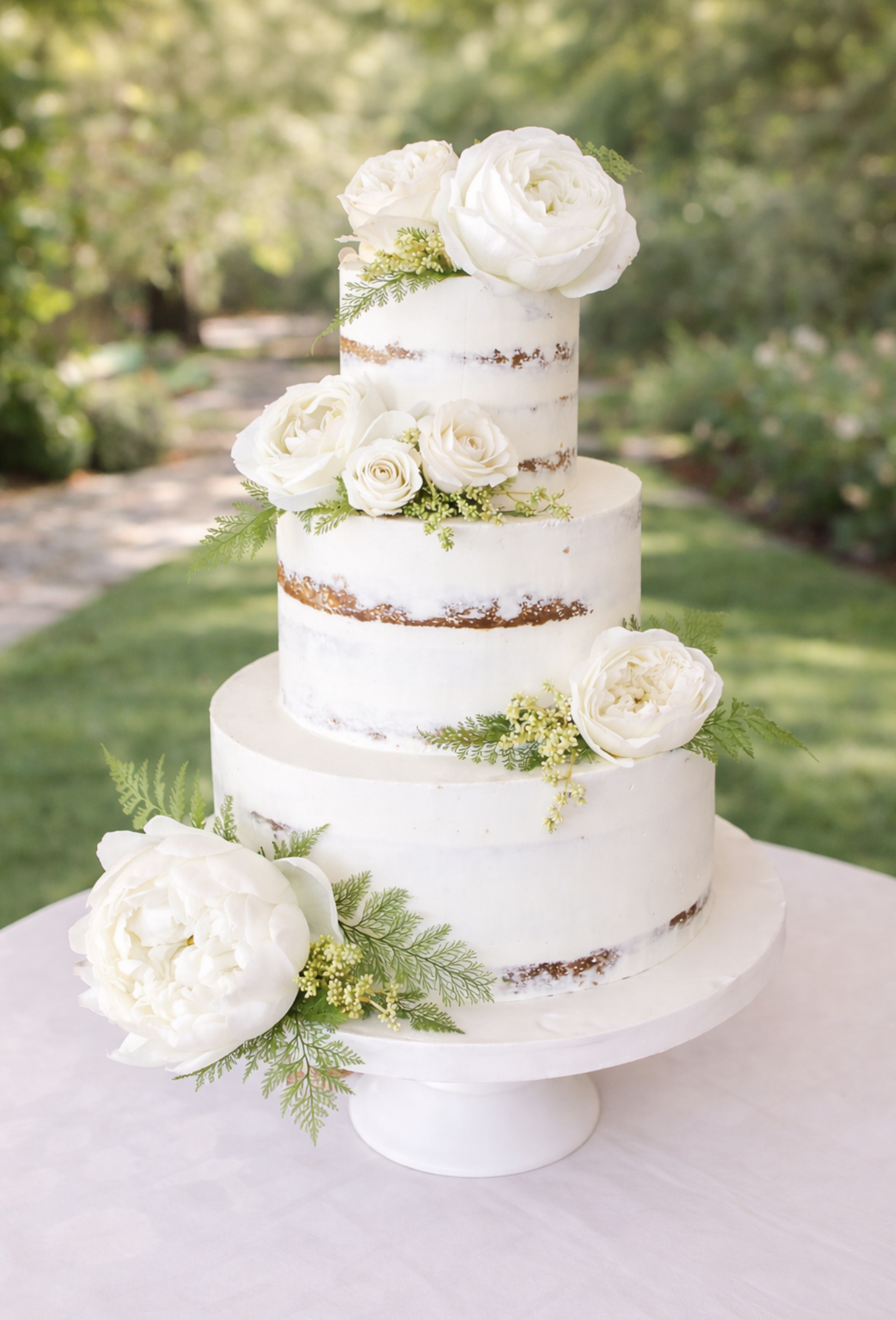 semi naked wedding cake.png