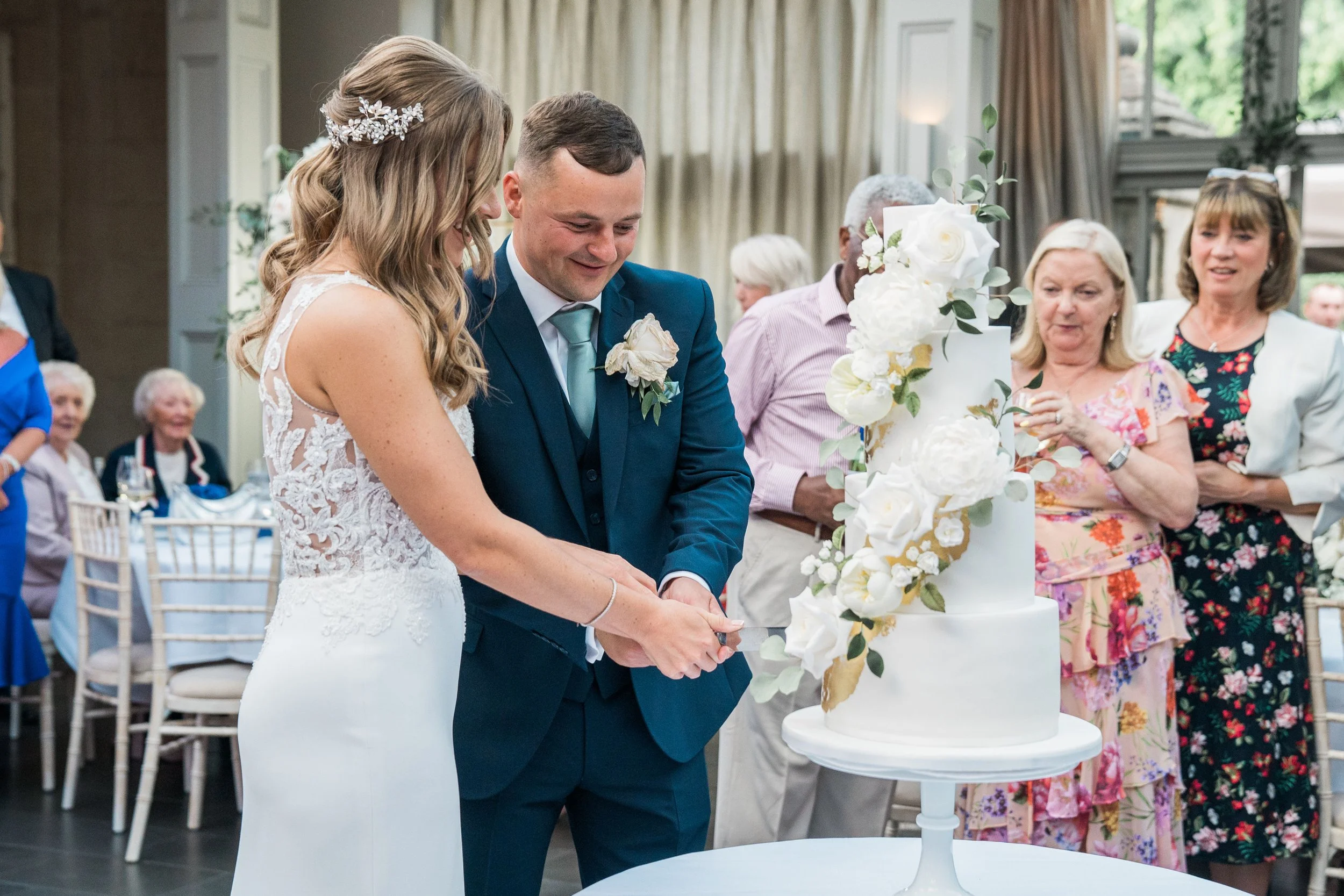 Cake cutting Elizabeth's Court.jpg