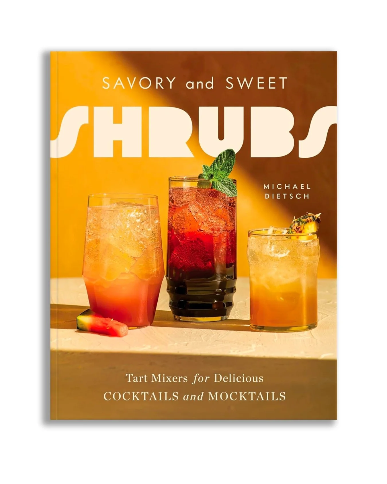 Book cover titled 'Savory and Sweet Shubs' by Michael Dietsch, showing three colorful cocktails with ice and garnishes, set against a yellow and brown background. Photo By Terragold Photo