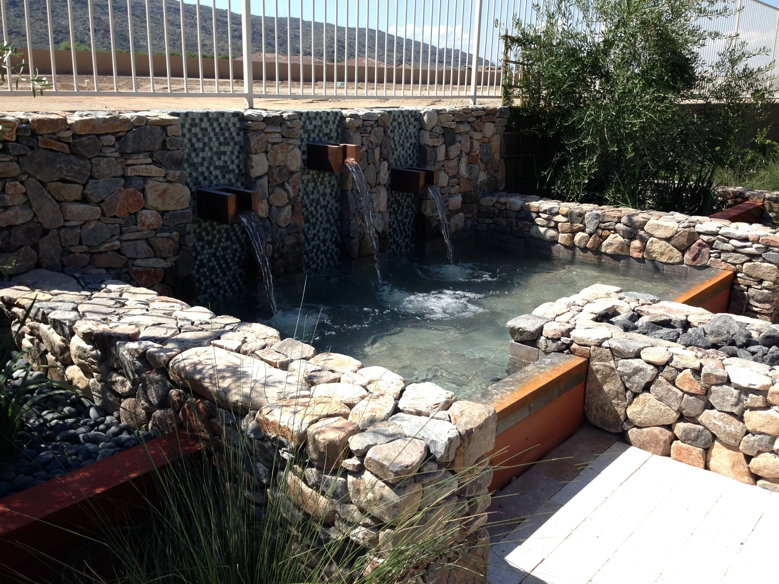 water feature fountain scuppers stone tile