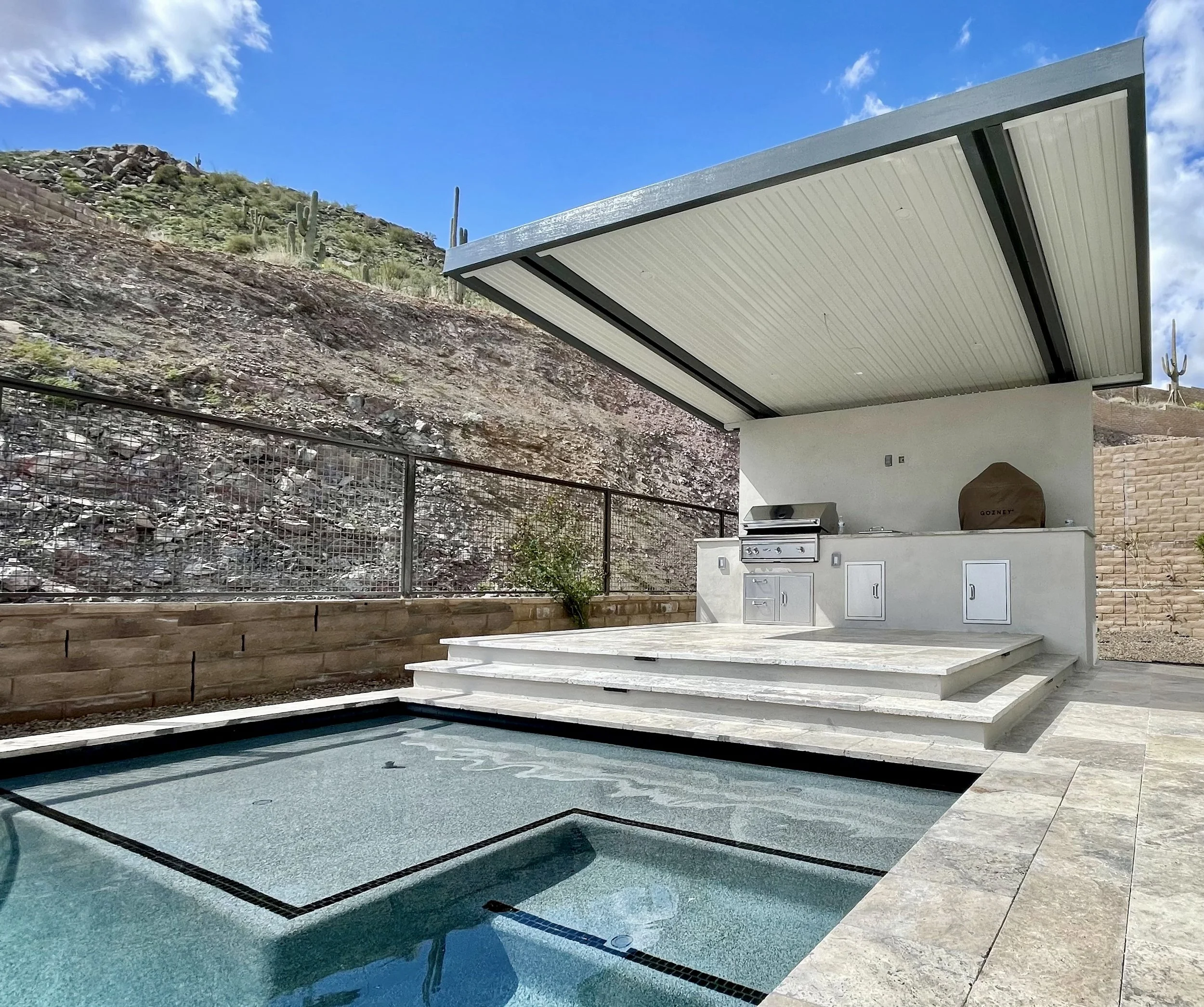 mountainside ramada pergola grill dining area pool sun shelf