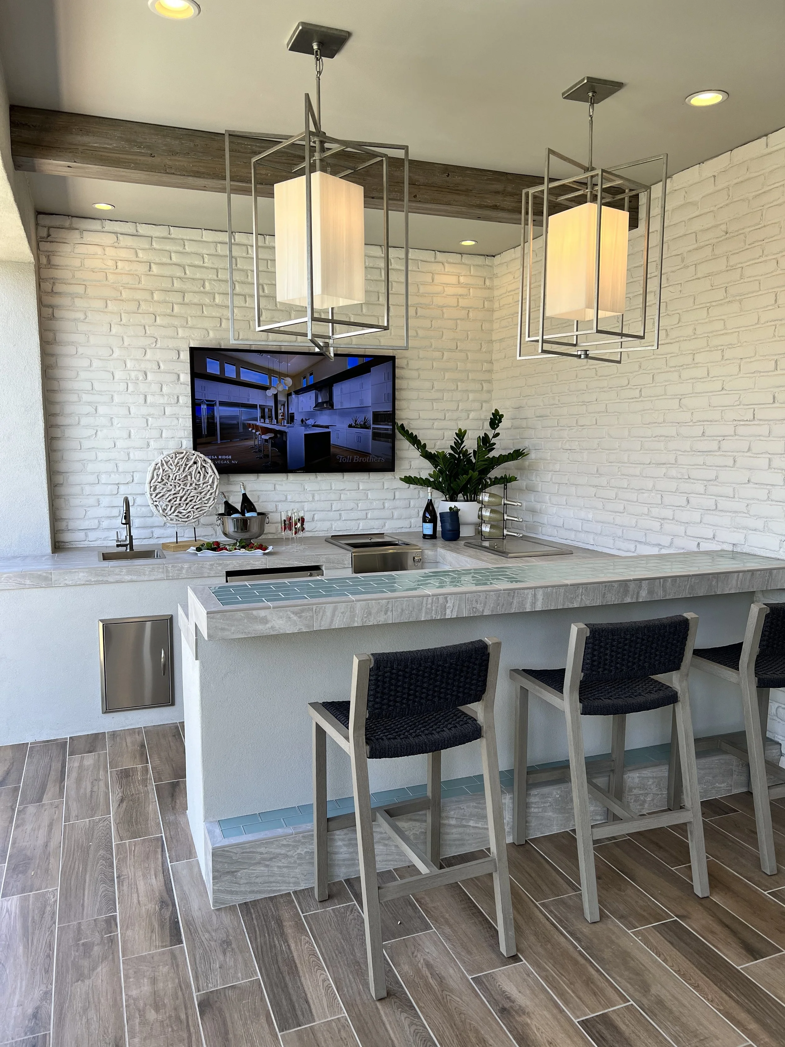 outdoor wet bar barstools eating entertainment are blue tile tv wall
