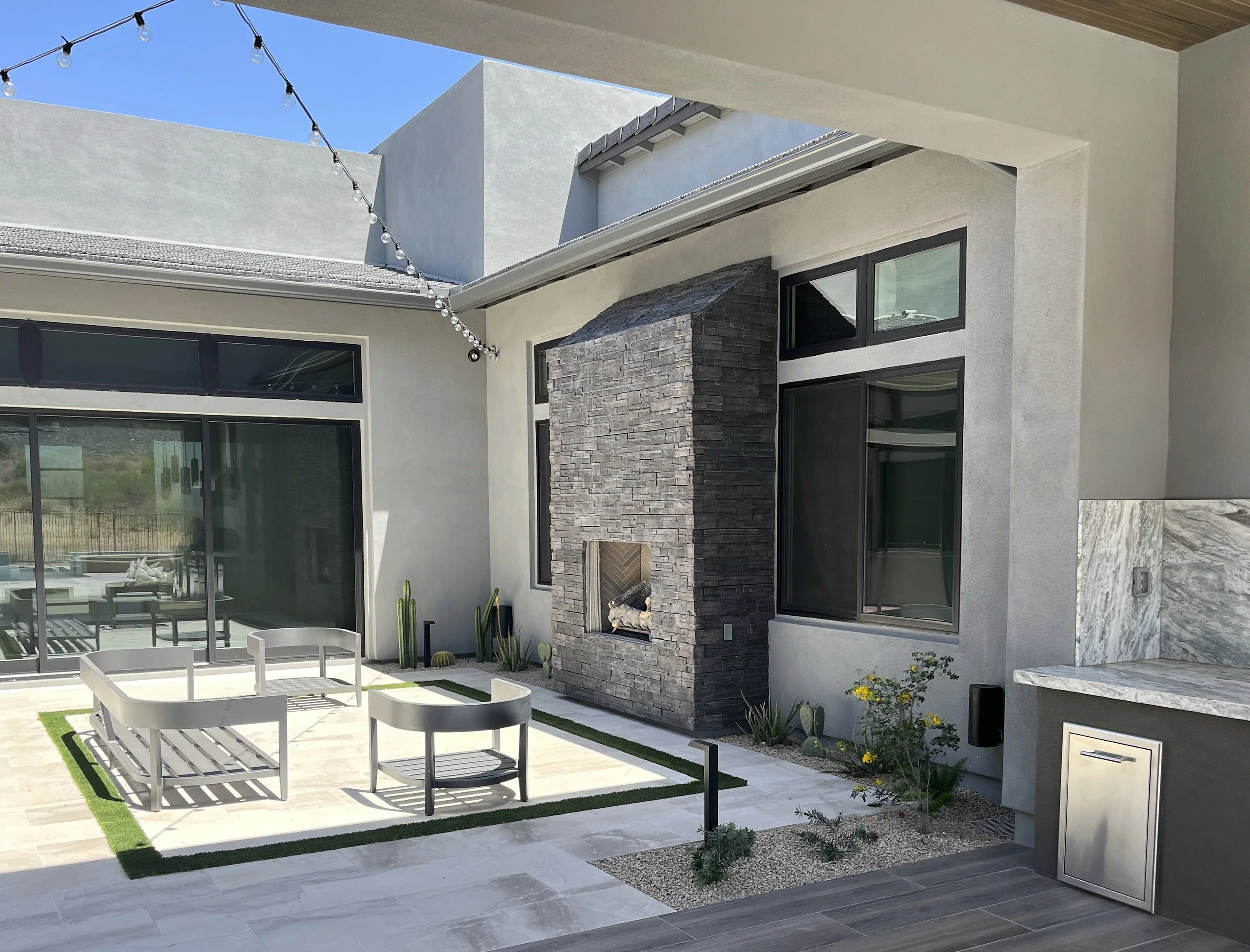 outdoor fireplace dark grey stacked stone