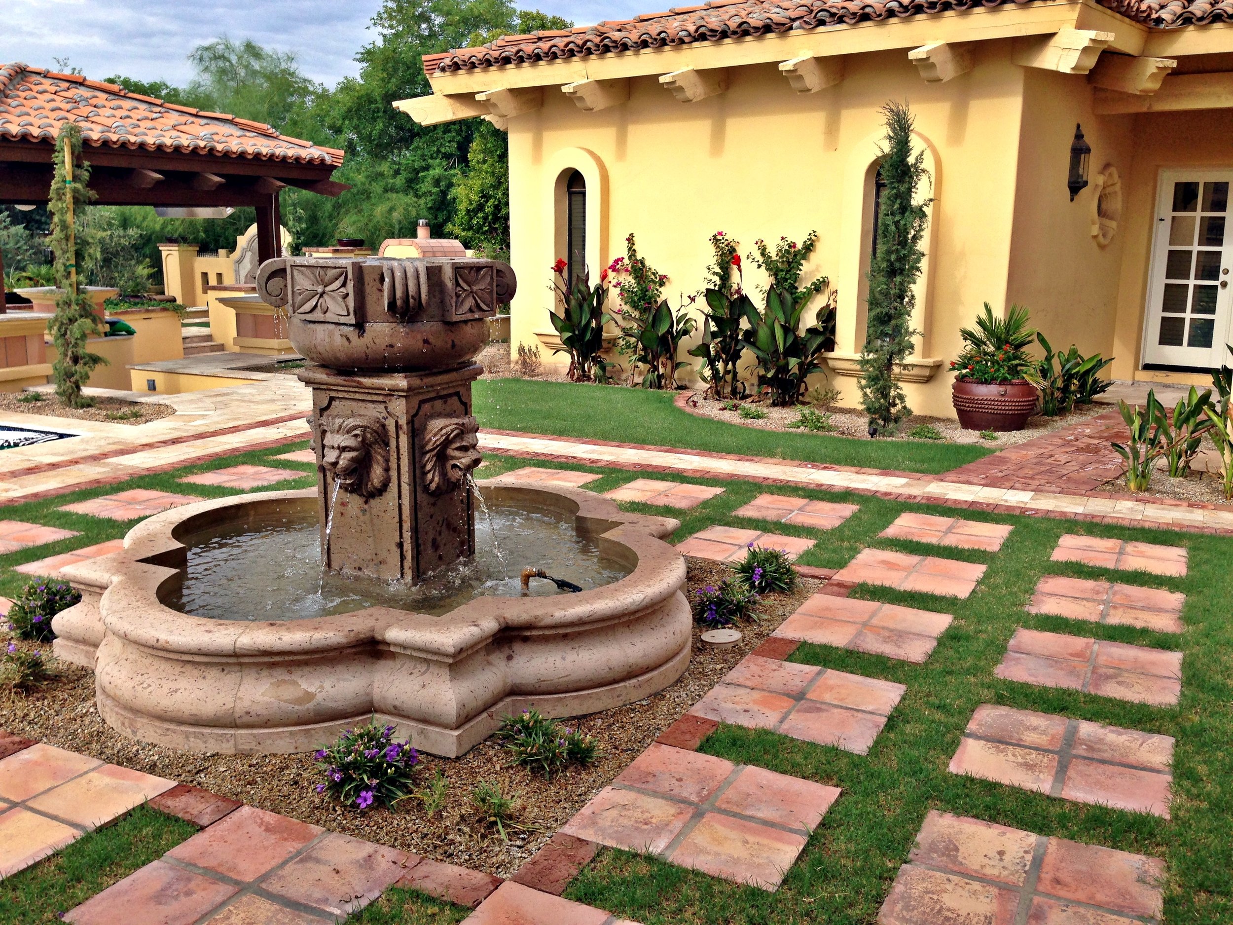 lion head water fountain terra cotta tiles tuscan