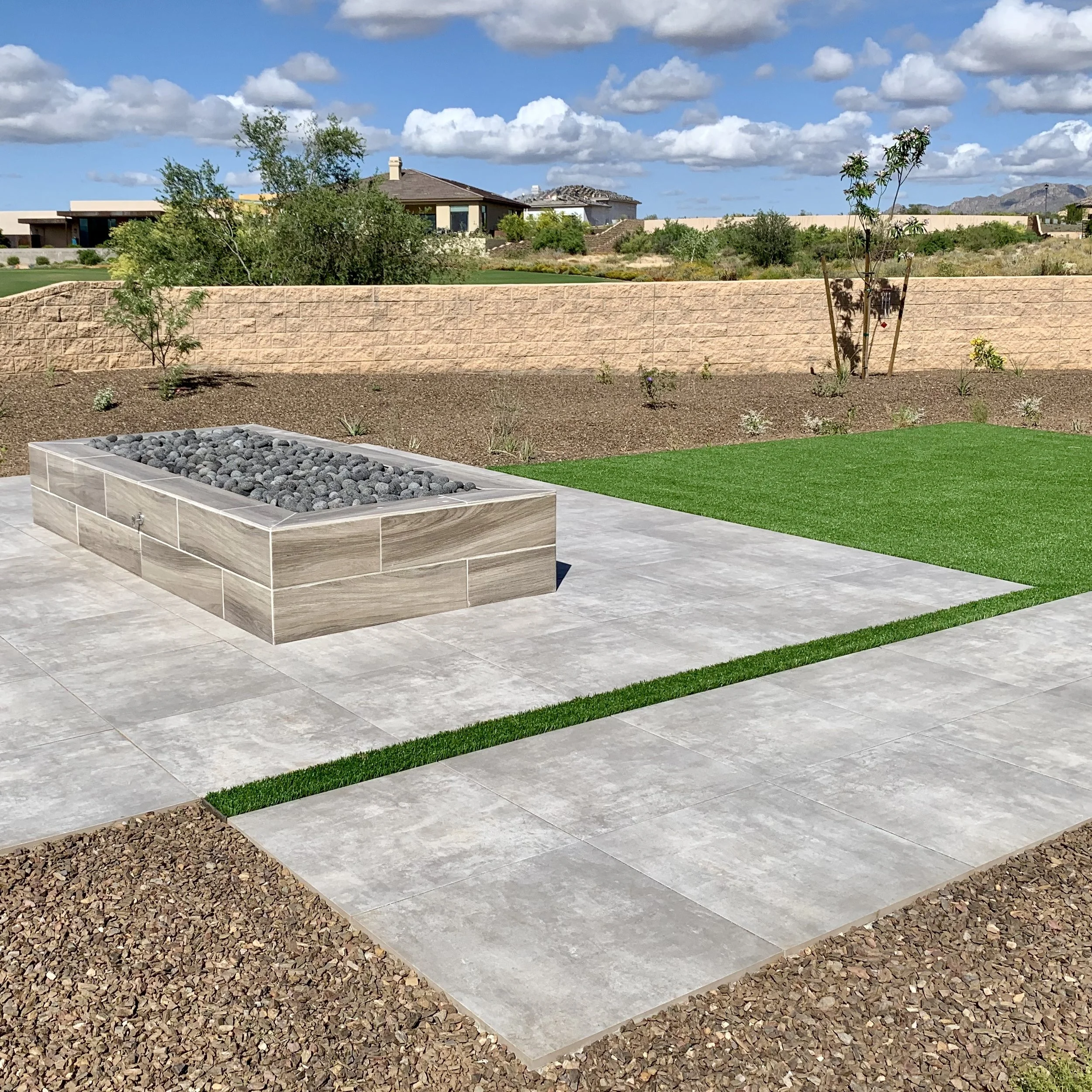 large rectangle firepit lava rock brown wood tile