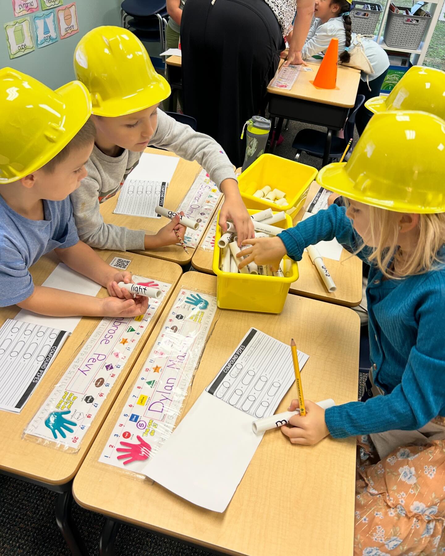 Our first graders were busy today with Construction Compounds! They geared up with their hard hats and got to work in various stations to practice their knowledge of compound words! 👷🚧🔨