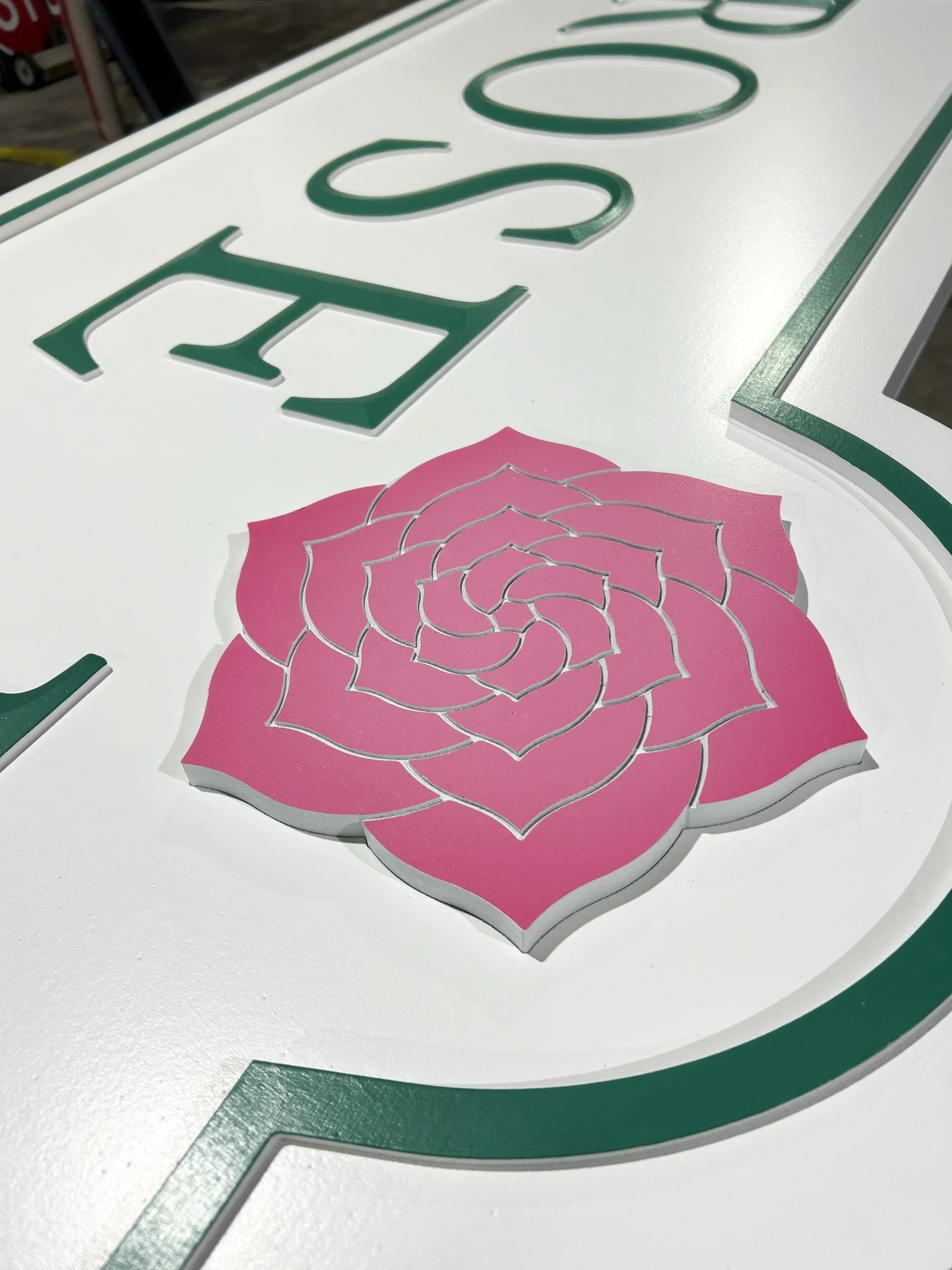 Created using our router and later hand painted, here&rsquo;s a fun addition to one of the most recent signs we created 🌺

#sign #signage #customsigns #cncrouter