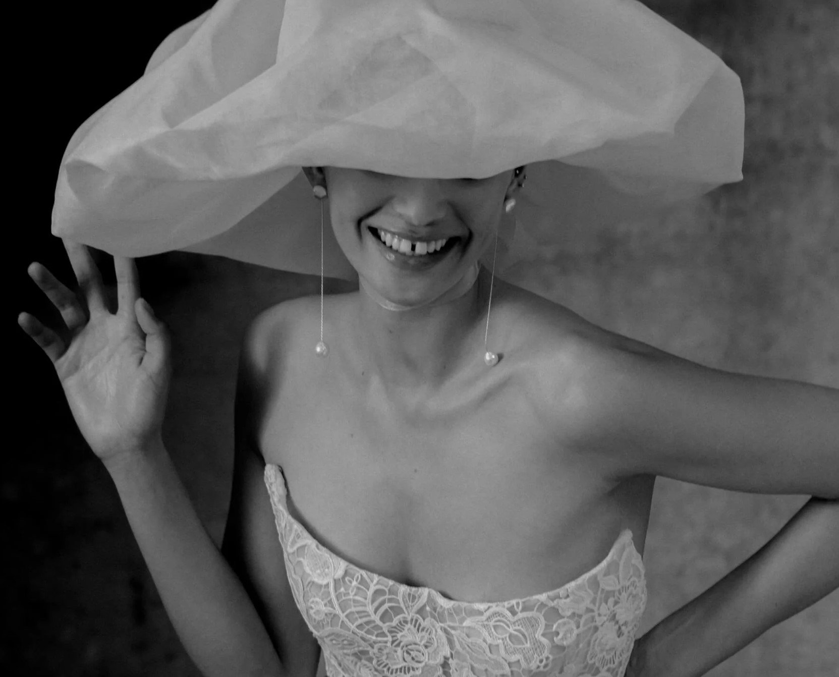 a.b. ellie earrings styled in the loho bride lookbook in a modern setting with fashion-forward wedding dresses.