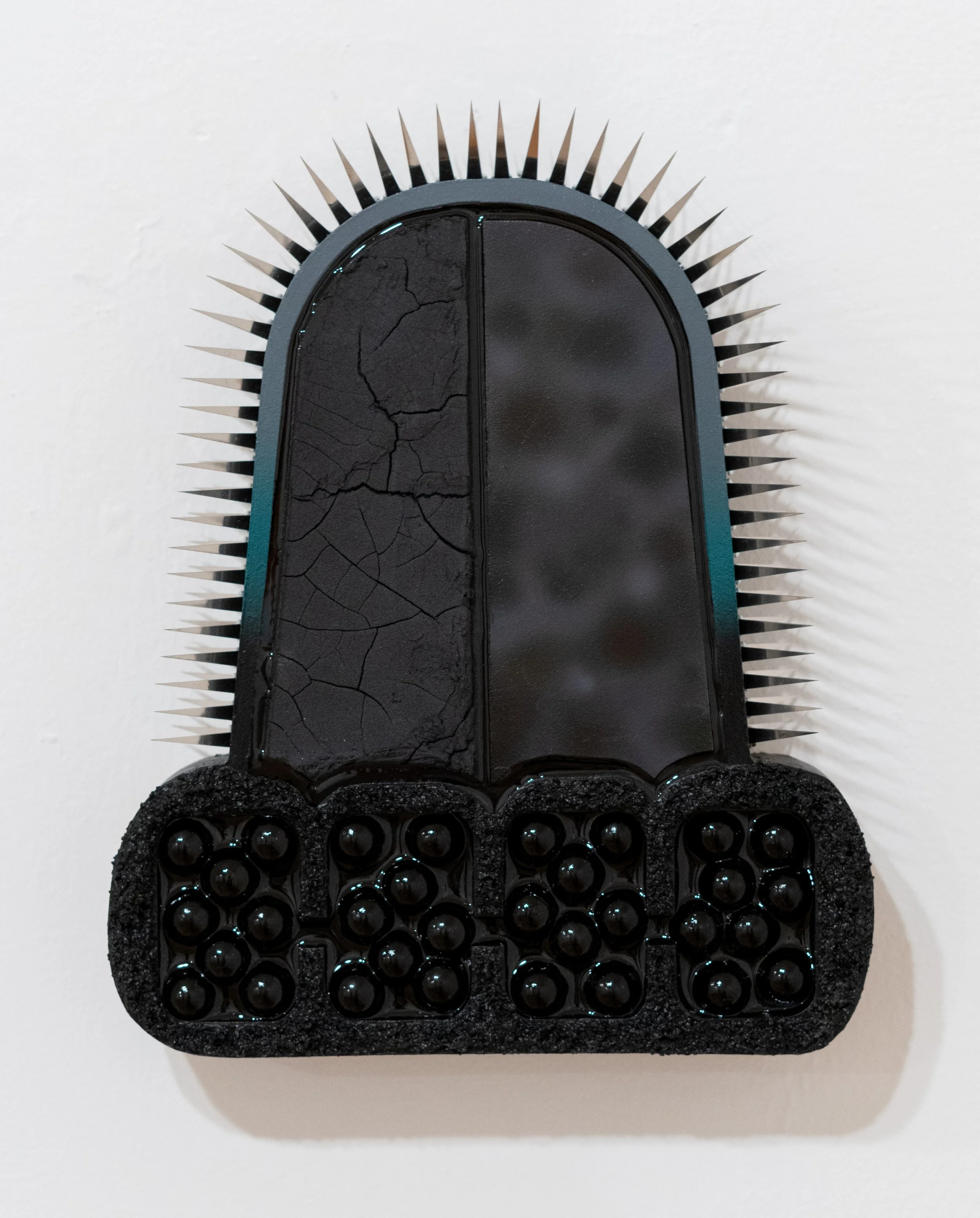 Jana Cariddi: Unit #10 (debaser), 2026. Acrylic, pumice, resin, marbles, and bird wire on CNC milled wood; 10 ½ x 9 ½ inches.