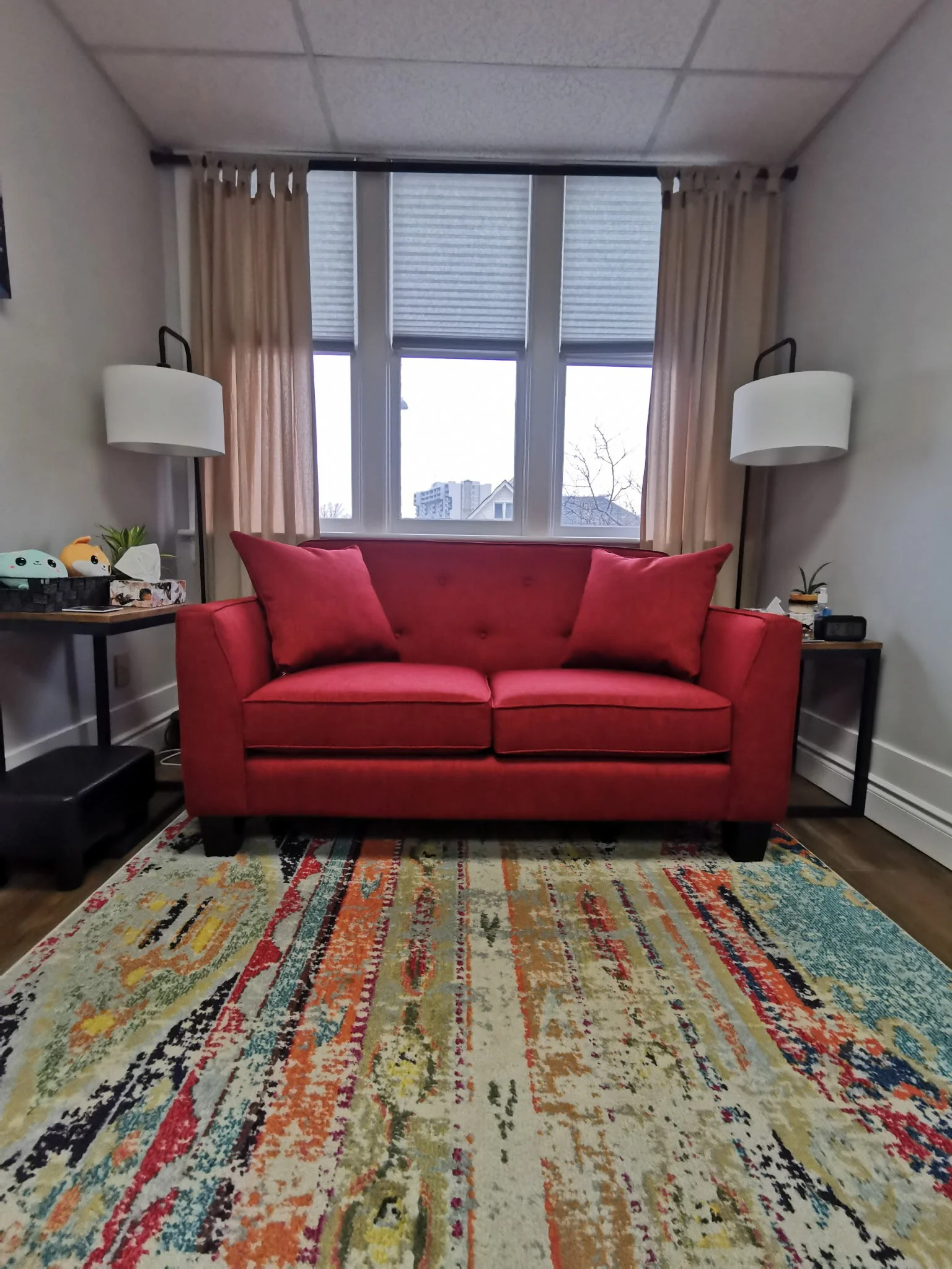 Office with red couch at 235 Frederick St Kitchener where Grace Brown provides counselling in Kitchener-Waterloo