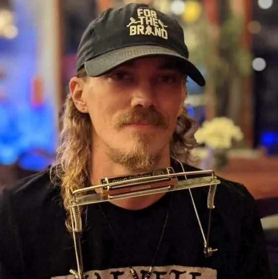 Andrew Hobbs with harmonica