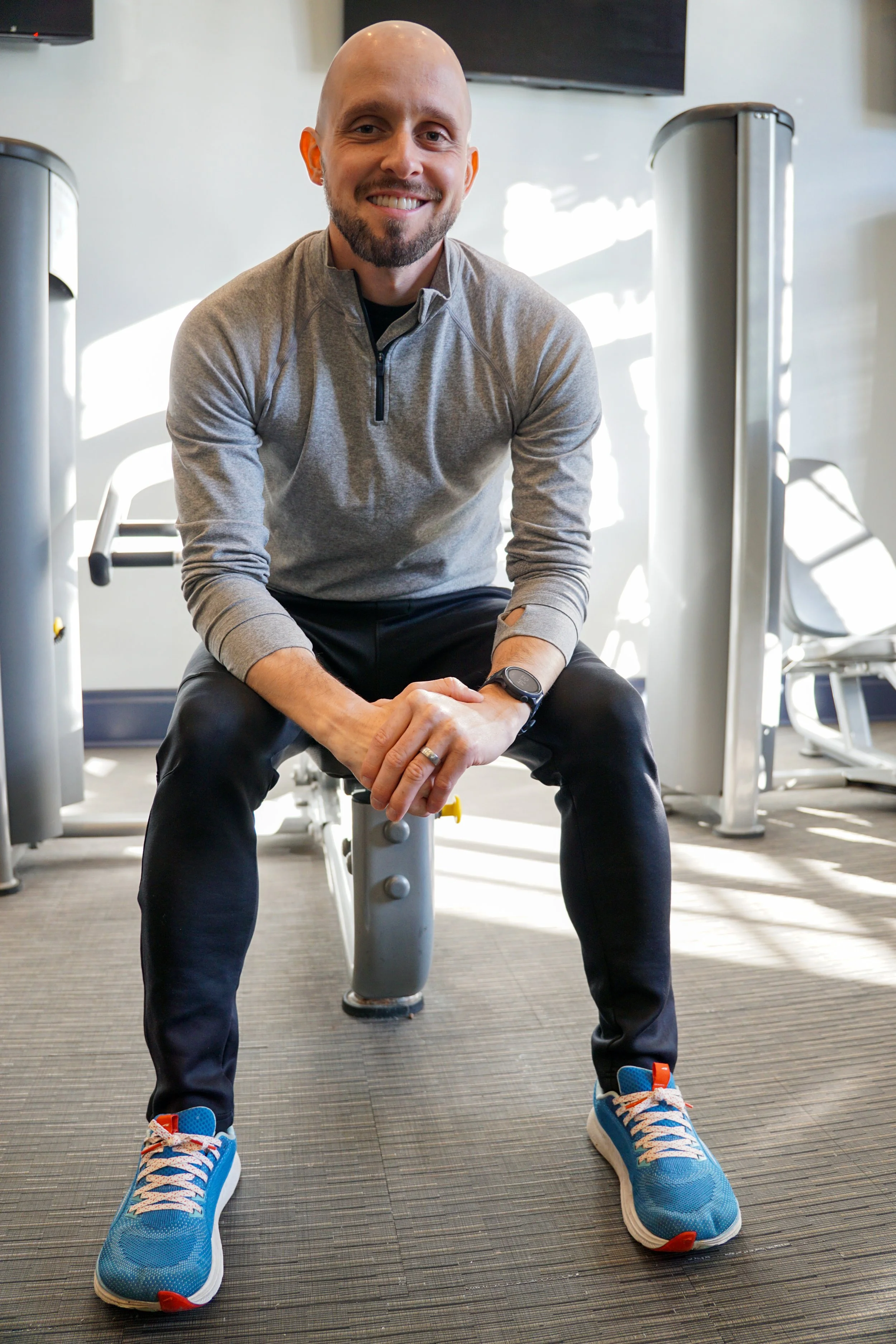 Nick Gornick PT, DPT sitting in a gym