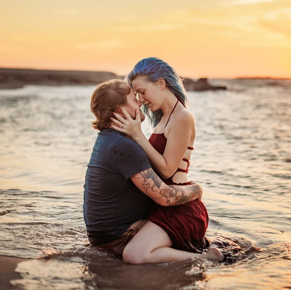Jacksonville Florida couples photographer Tiffany Joyce sharing an intimate moment with her partner in the water during sunset