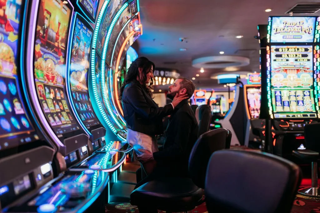 The newlyweds celebrate together under the neon lights of Fremont Street