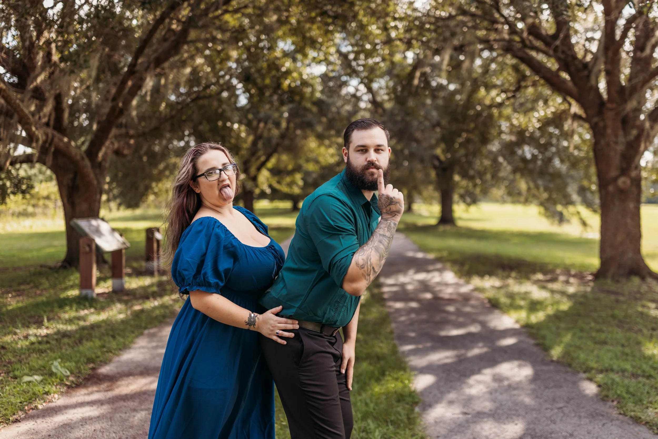 Family playing together in open field during sunset session at Camp Milton in West Jacksonville Florida
