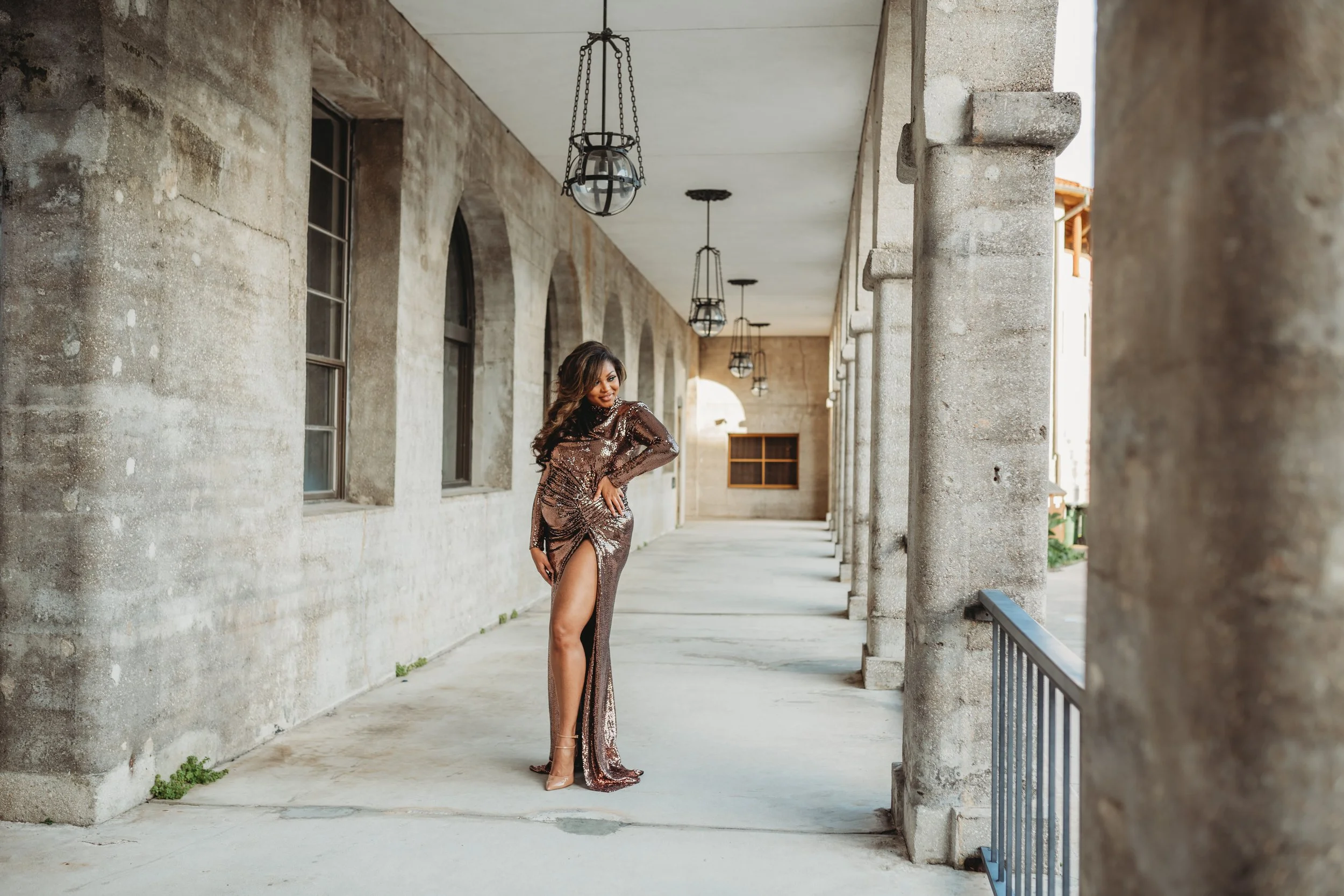 Maternity photos at Lightner Museum in St. Augustine Florida with elegant architecture and soft natural light