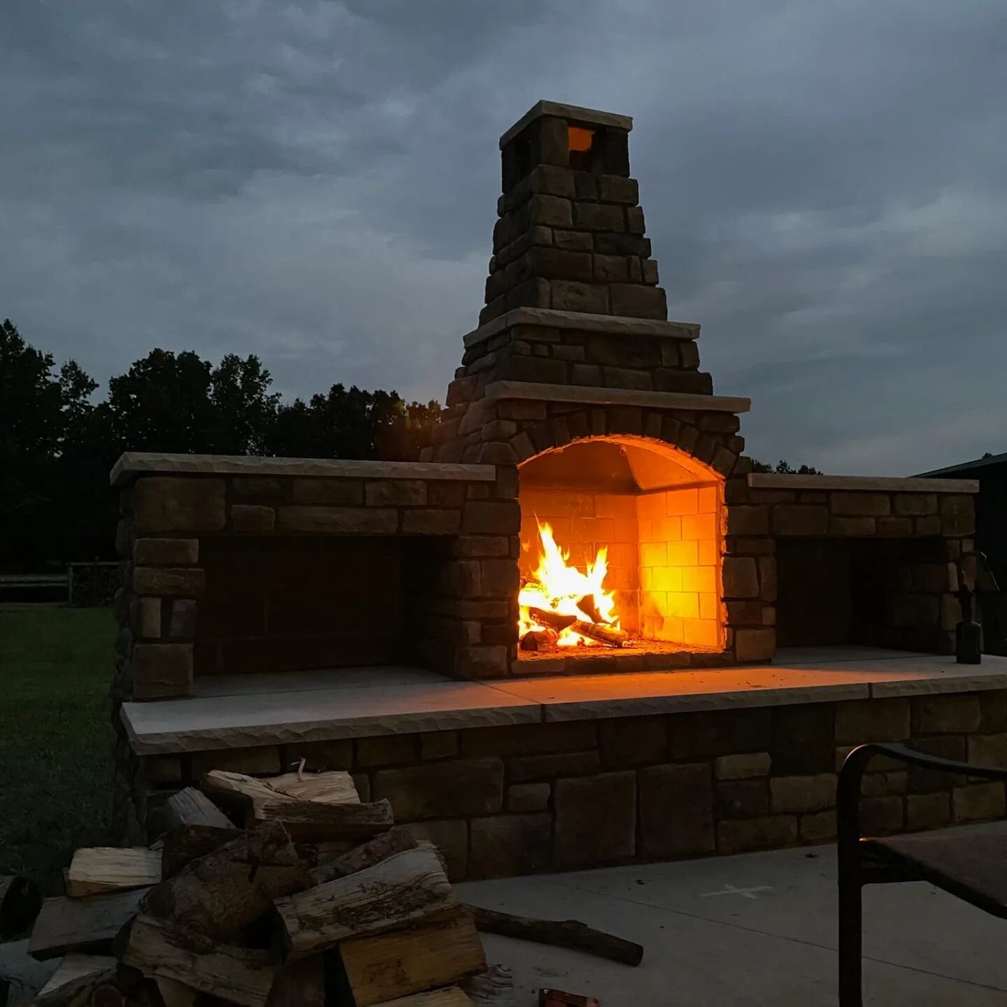 This is the process of building a custom outdoor fireplace. The finished product goes great with a beer and s'mores