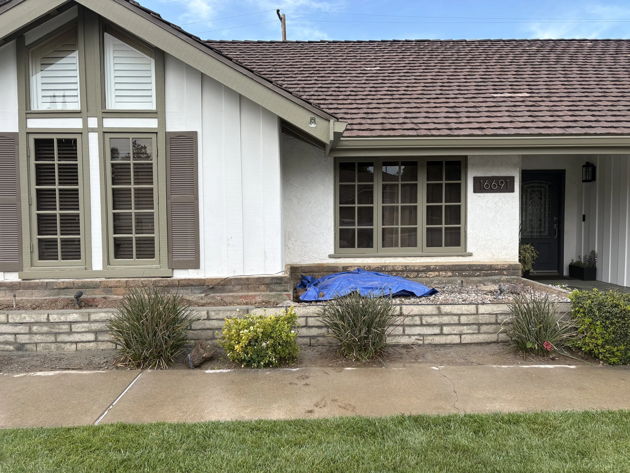 Leveling foundation, replacing rebar, placing new blocks.