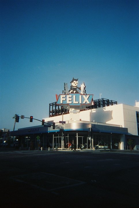 FELIX Auto Dealer sign. 35mm Holga, Cadido 800 Color