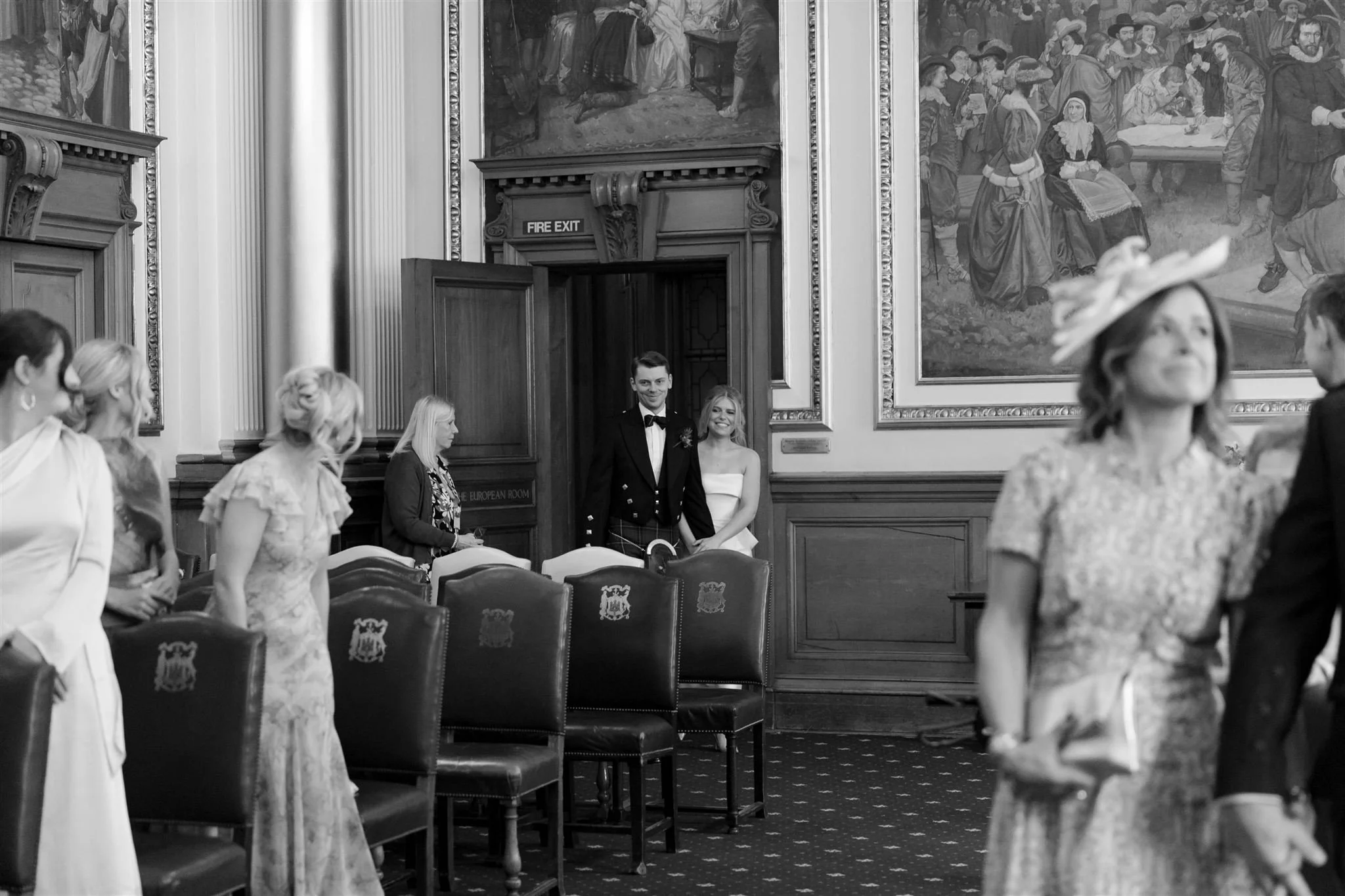 Bride entering ceremony on a wedding day at Edinburgh City Chambers, photographed by an Edinburgh Scotland Wedding Photographer..