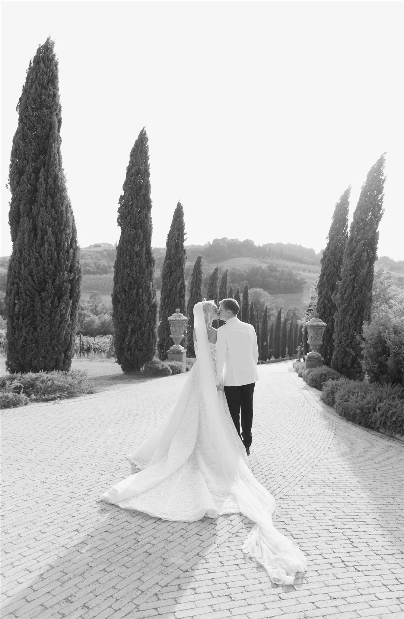 A bride and groom on a wedding day at Tenuta Corbinaia Villa in Tuscany, Italy.