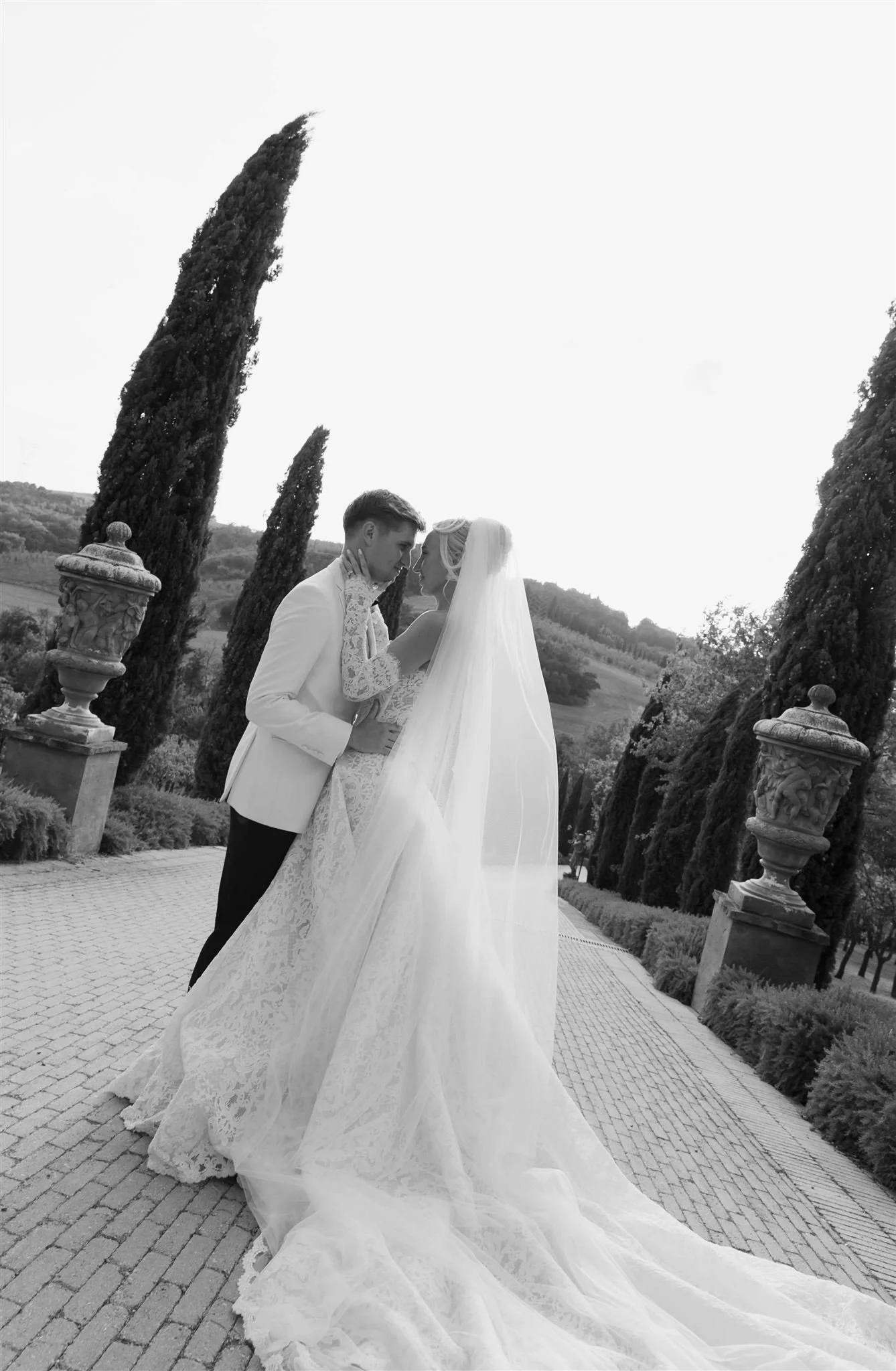 A bride and groom on a wedding day at Tenuta Corbinaia Villa in Tuscany, Italy.