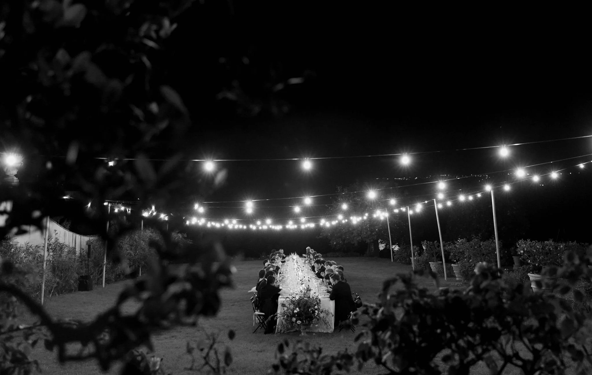 Garden wedding reception on a wedding day at Villa Medicea Di Lilliano in Tuscany, Italy.