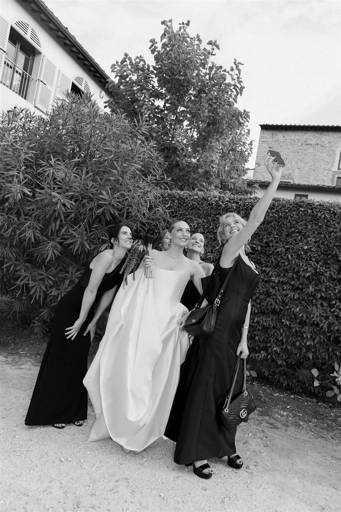 Bridesmaids on a wedding day at Villa Medicea Di Lilliano in Tuscany, Italy.