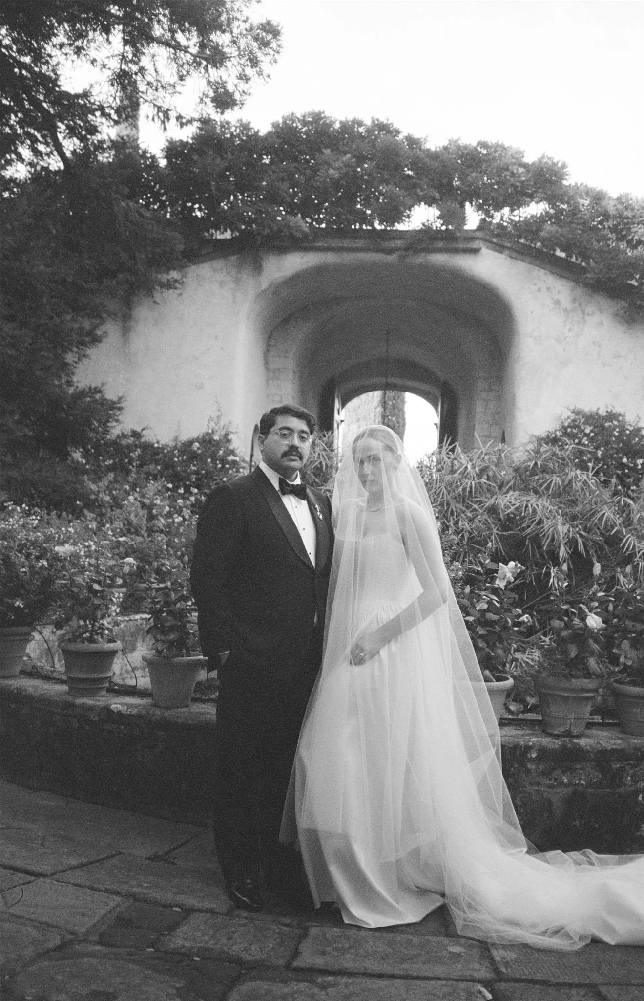 Garden Wedding Ceremony on a wedding day at Villa Medicea Di Lilliano in Tuscany, Italy.