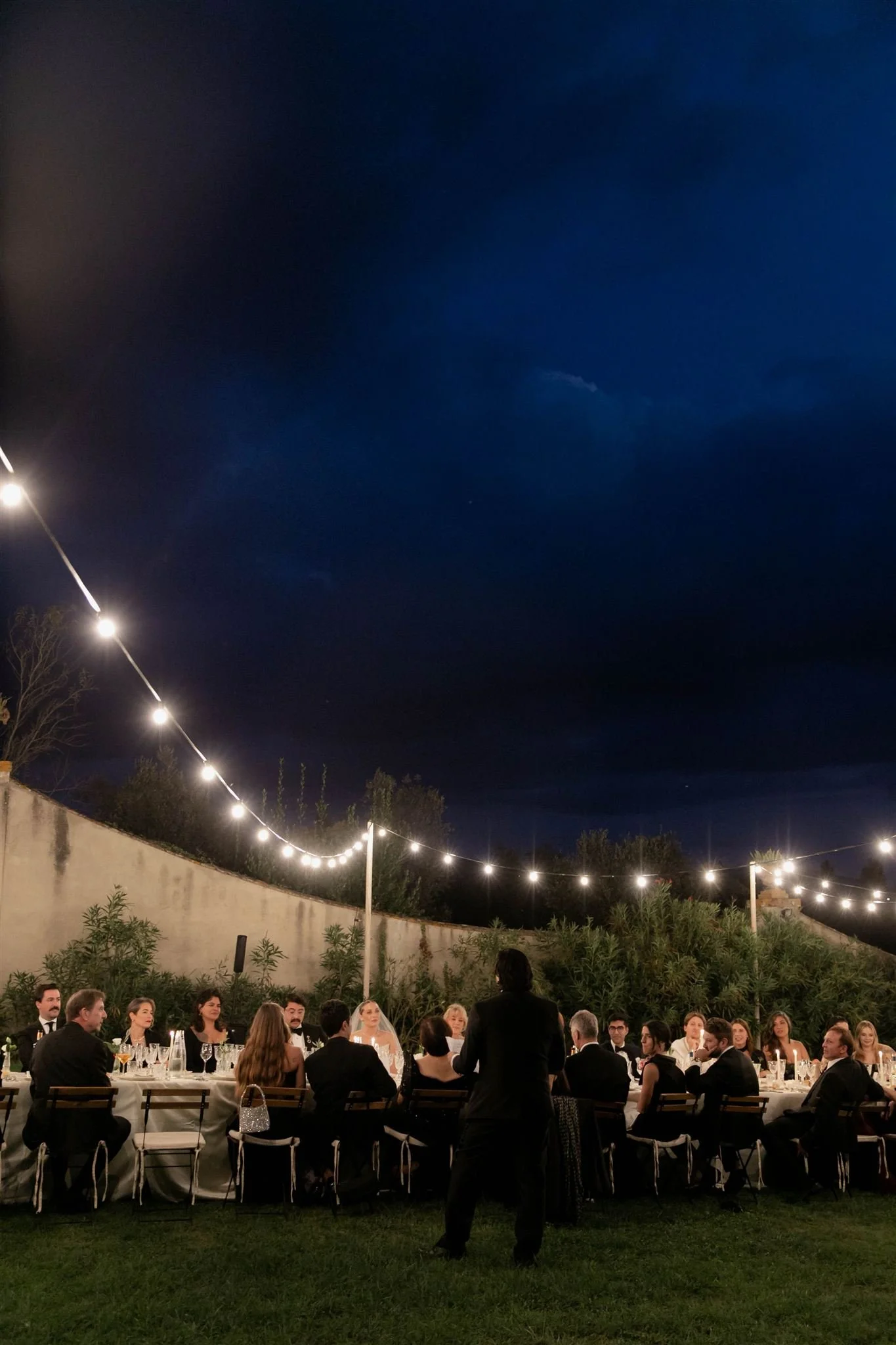Garden wedding reception on a wedding day at Villa Medicea Di Lilliano in Tuscany, Italy.