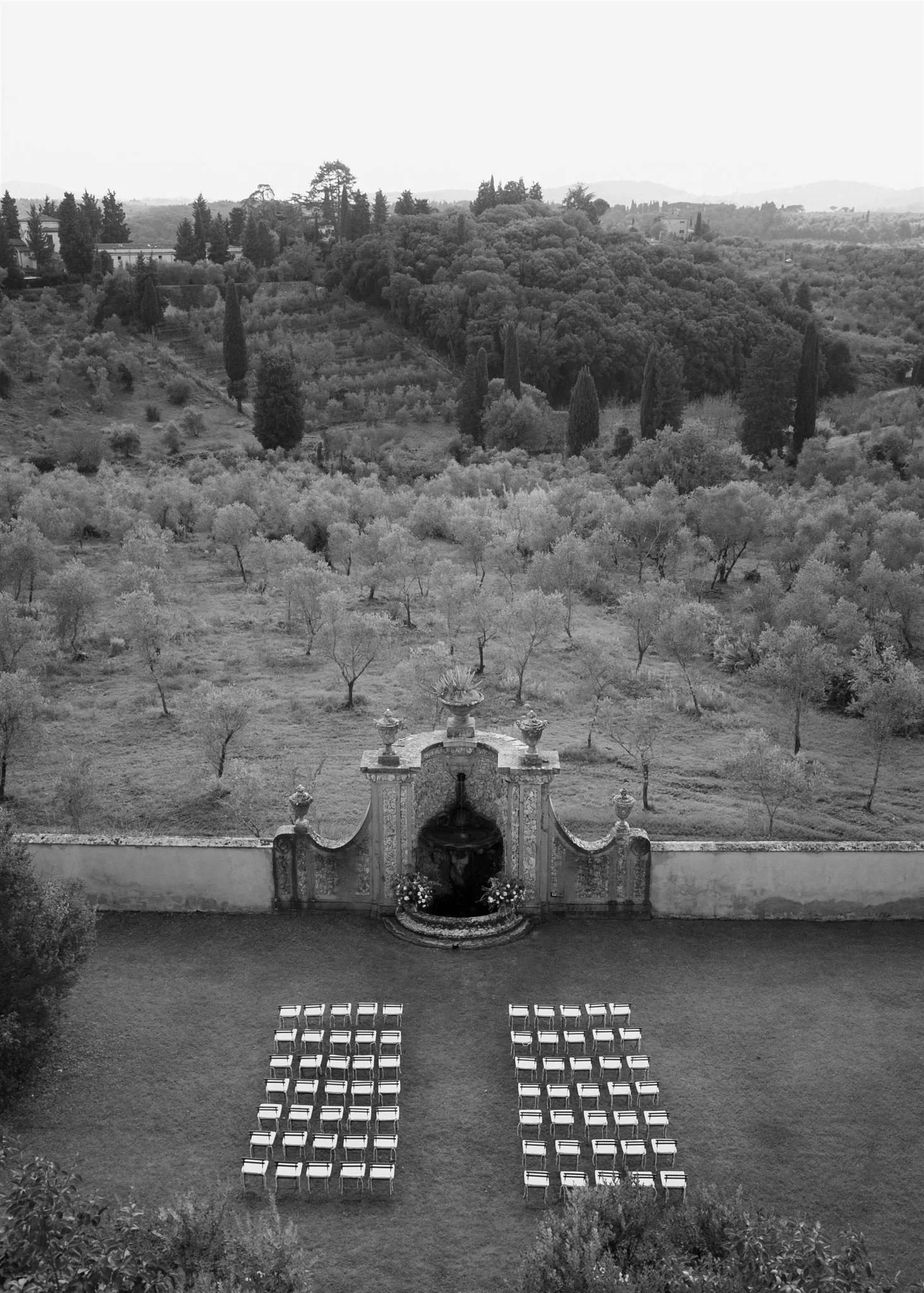 Garden Wedding Ceremony on a wedding day at Villa Medicea Di Lilliano in Tuscany, Italy.