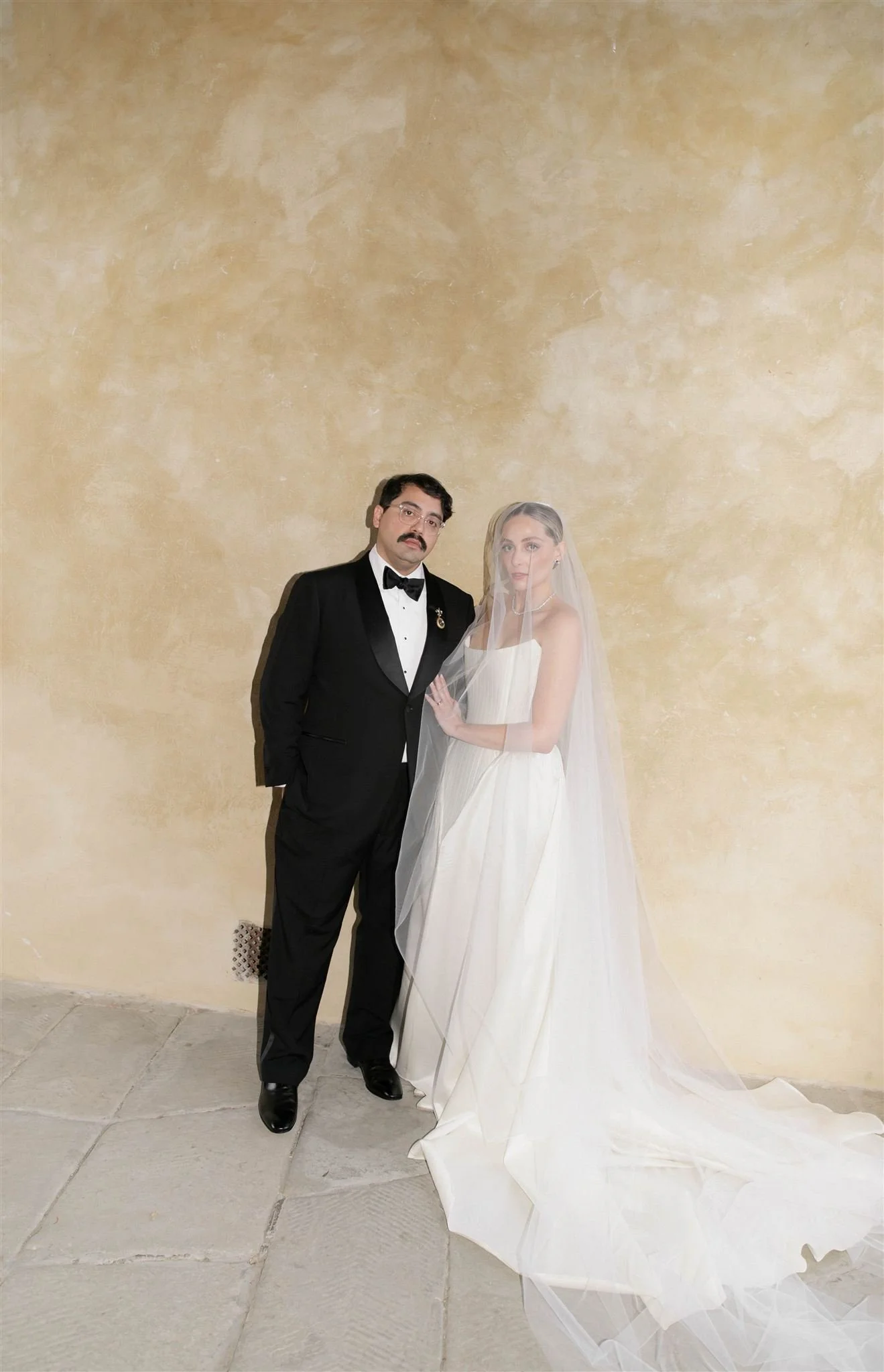 Bride and Groom on a wedding day at Villa Medicea Di Lilliano in Tuscany, Italy.