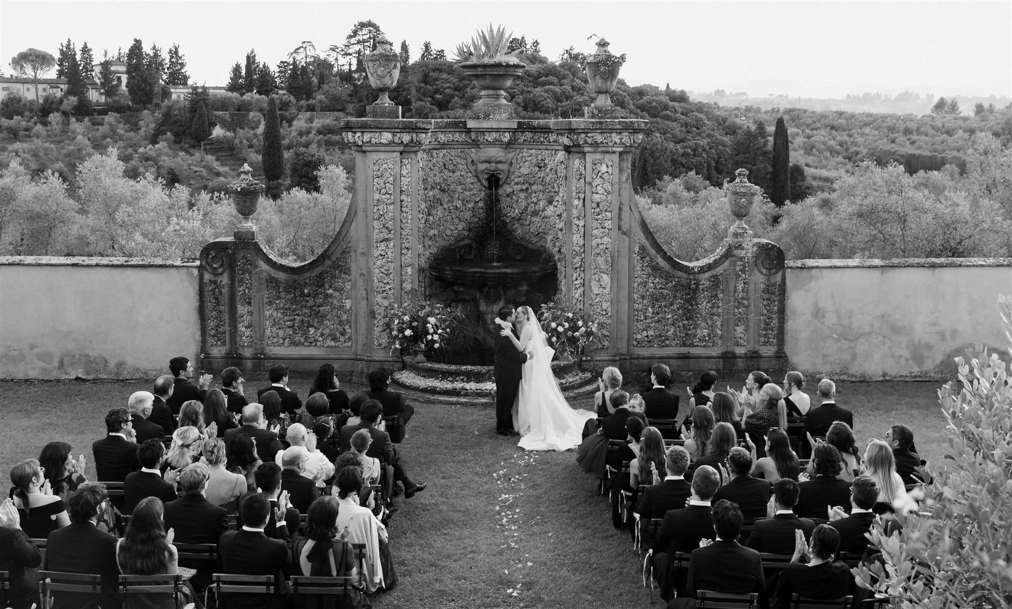 Garden Wedding Ceremony on a wedding day at Villa Medicea Di Lilliano in Tuscany, Italy.