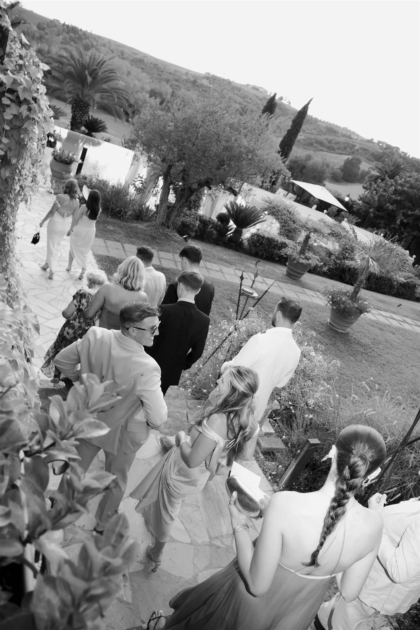 A poolside cocktail hour on a wedding day at Tenuta Corbinaia Villa in Tuscany, Italy.