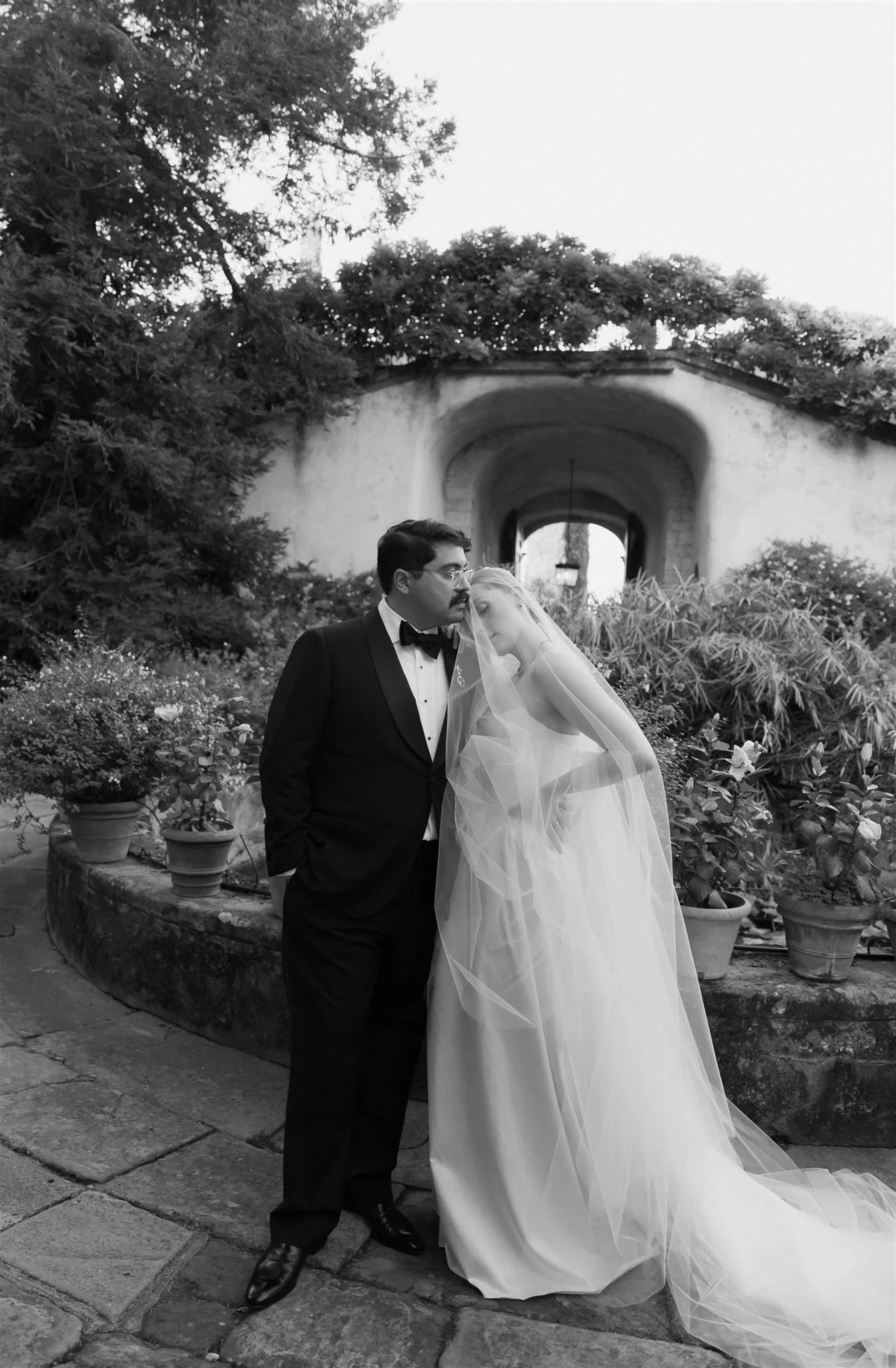Bride and Groom on a wedding day at Villa Medicea Di Lilliano in Tuscany, Italy.