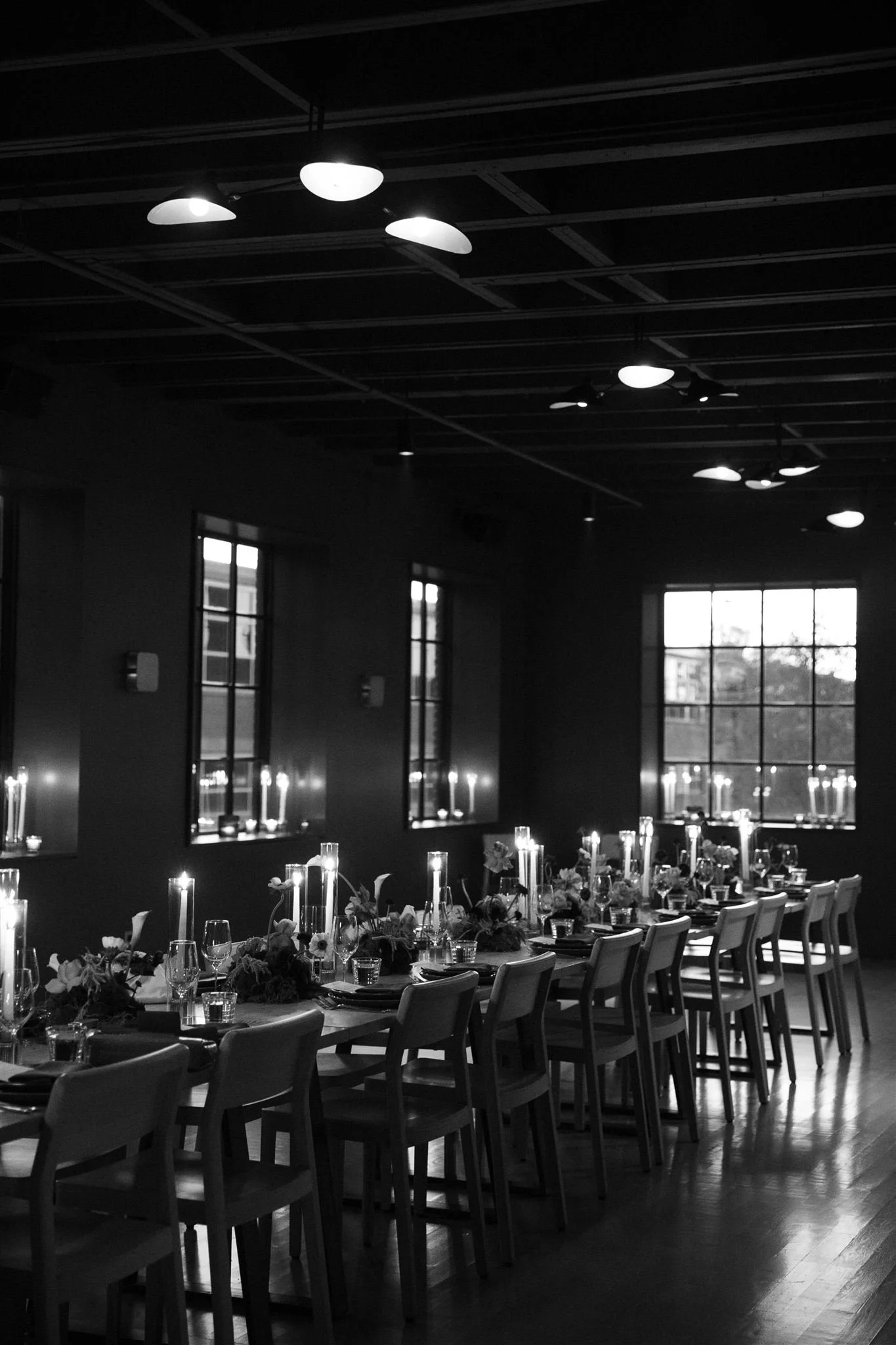 Romantic candlelit rehearsal dinner at Maxwells Trading Chicago wedding venue.