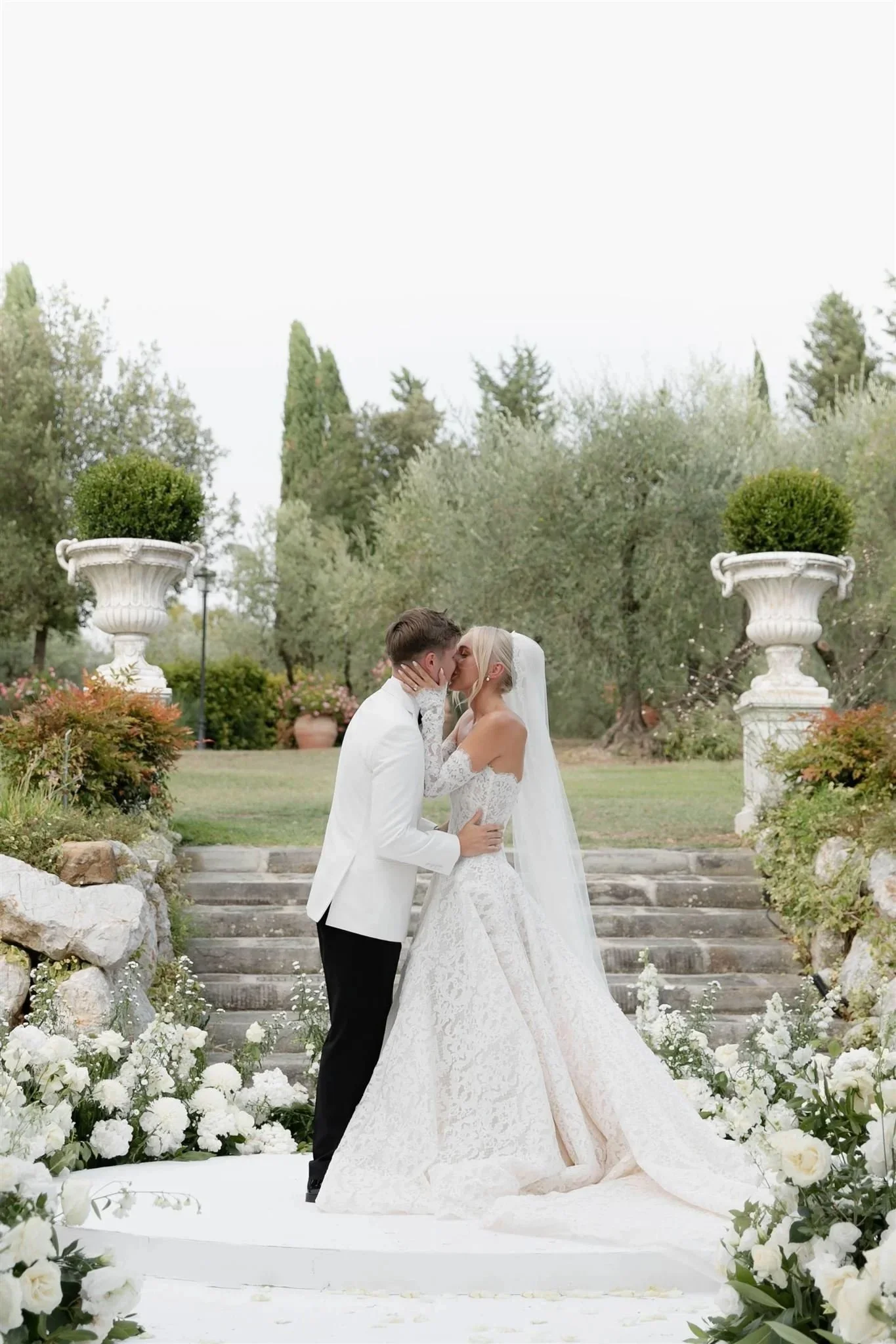 An outdoor wedding ceremony at Tenuta Corbinaia Villa in Tuscany, Italy.