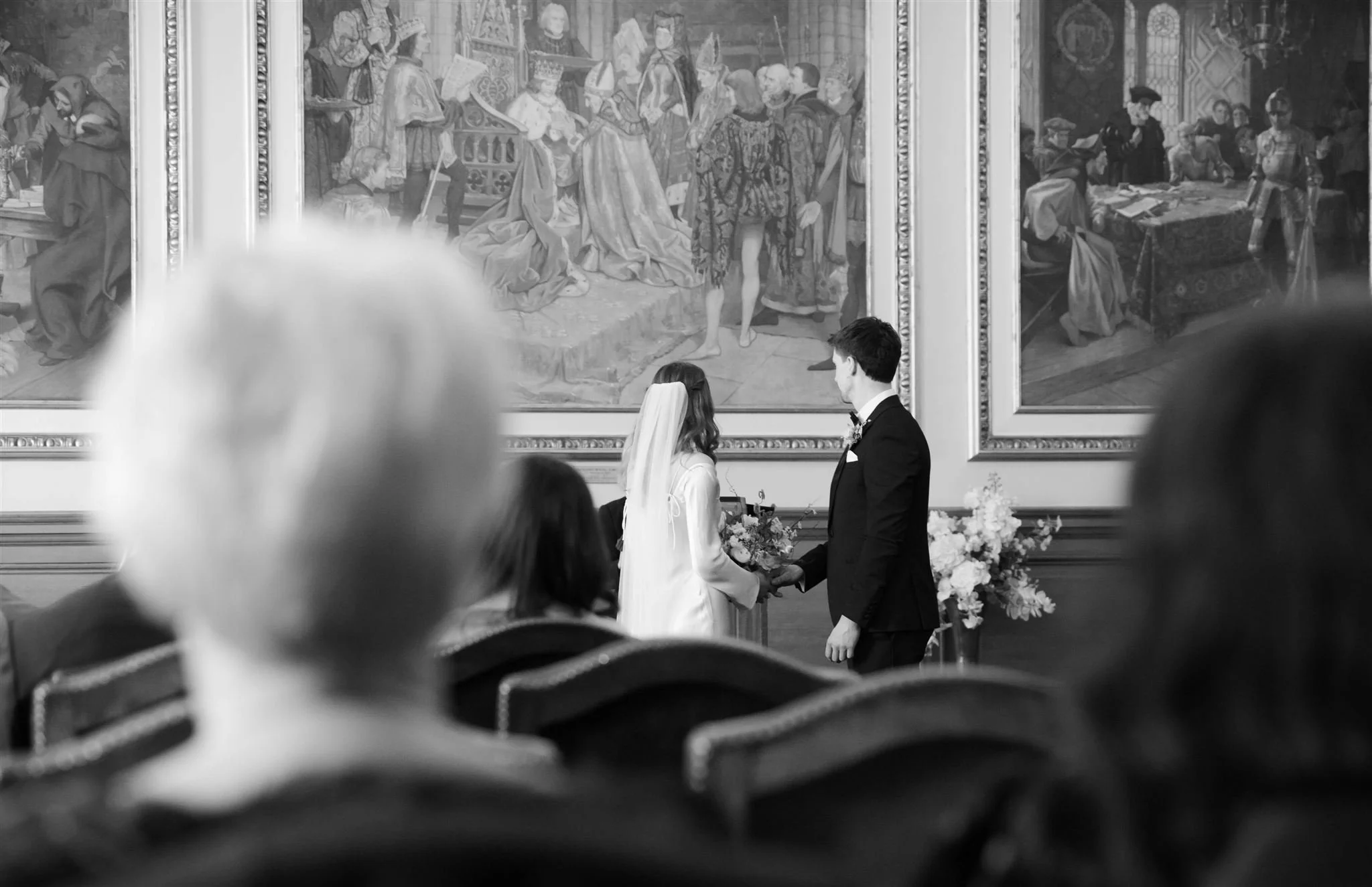 Bride and groom at a wedding Ceremony at Edinburgh City Chambers in Edinburgh, professional wedding photography by an Edinburgh City Chambers wedding photographer.