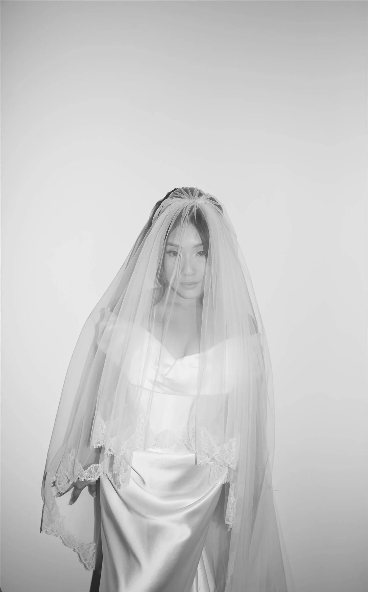 An editorial bridal portrait on her wedding day in Chicago.