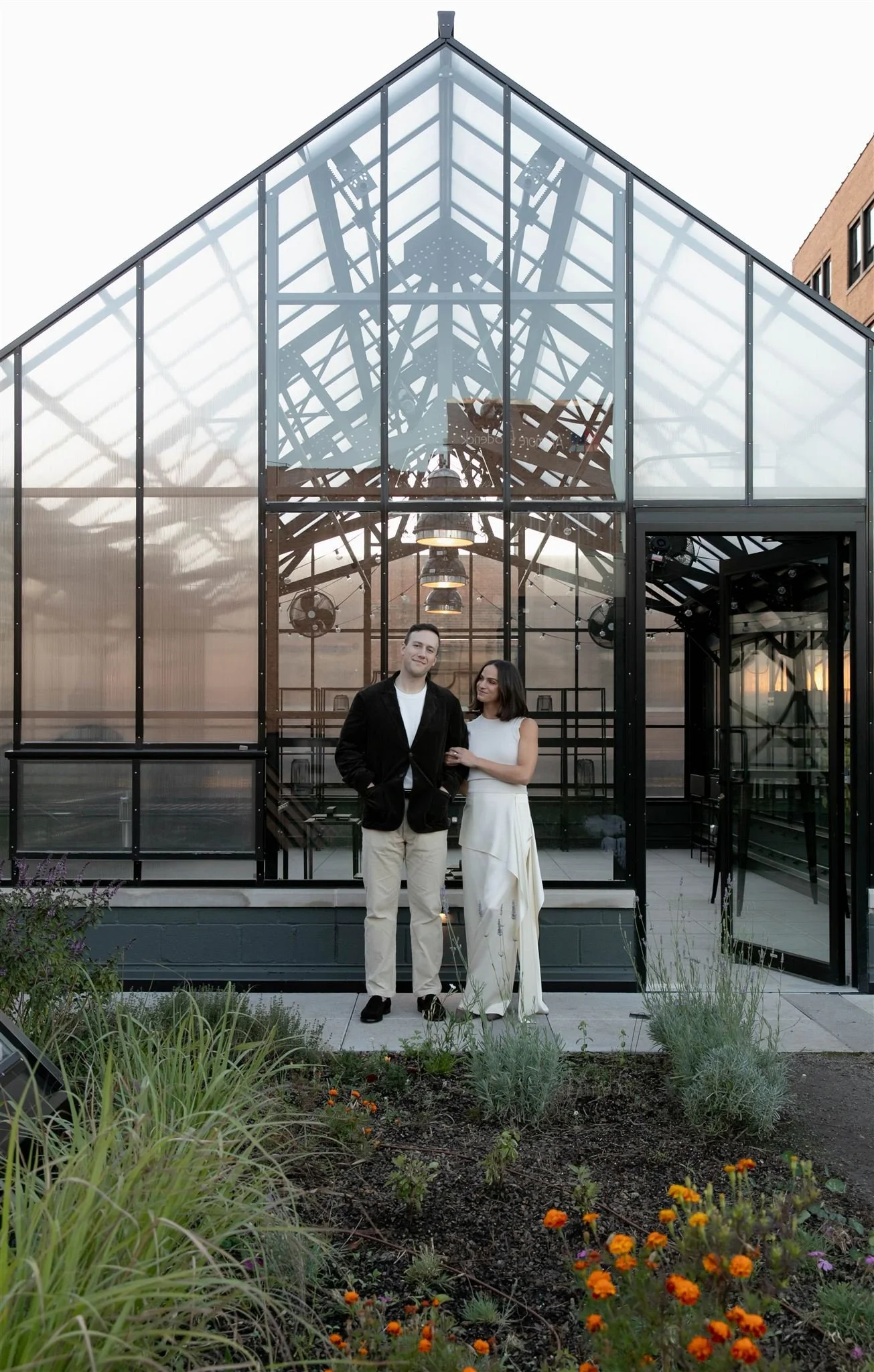 Maxwells Trading Chicago wedding rehearsal dinner with rooftop skyline portraits in downtown Chicago.