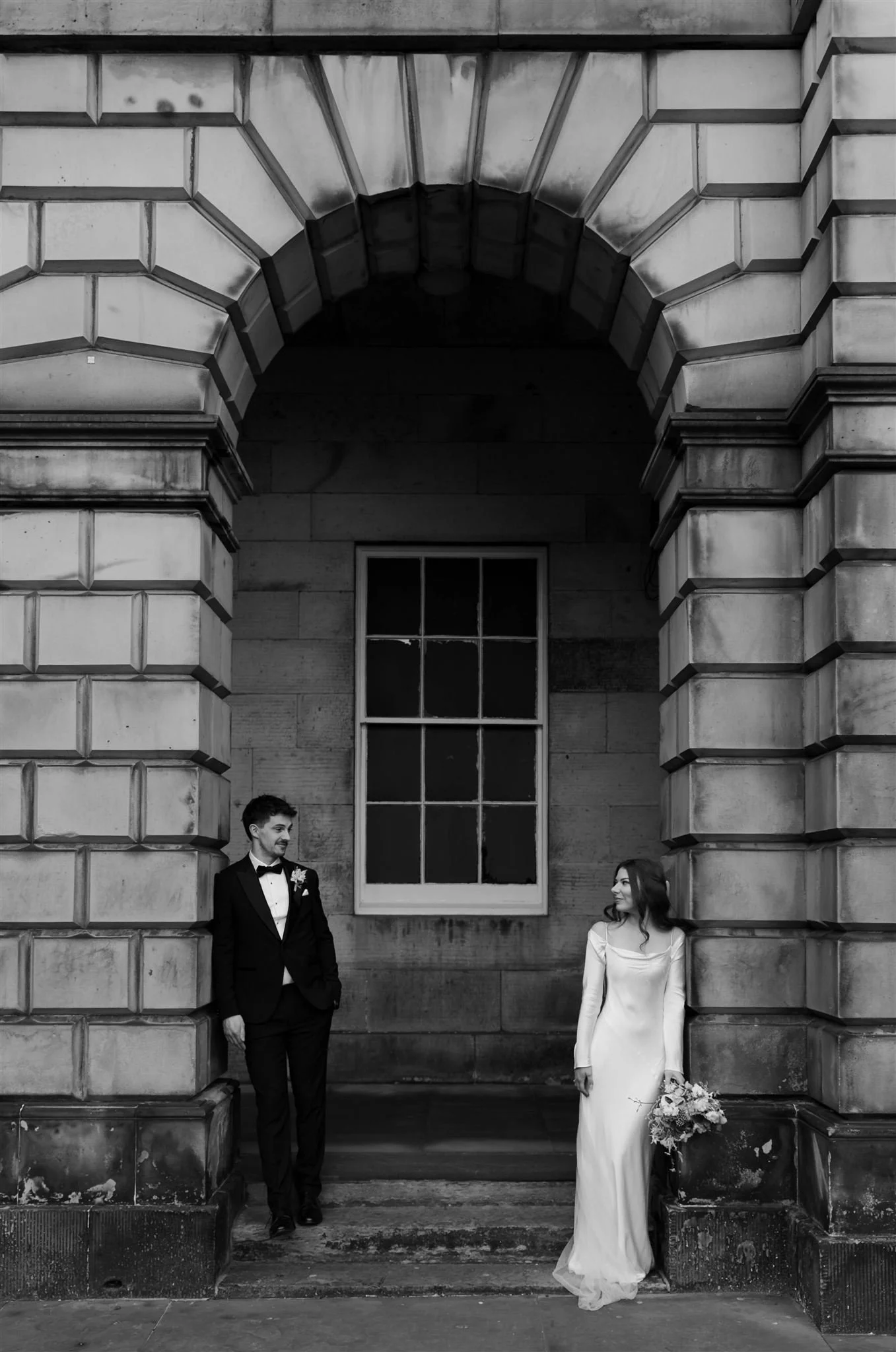 A couple at Edinburgh City Chambers in Edinburgh, professional wedding photography by an Edinburgh City Chambers wedding photographer.