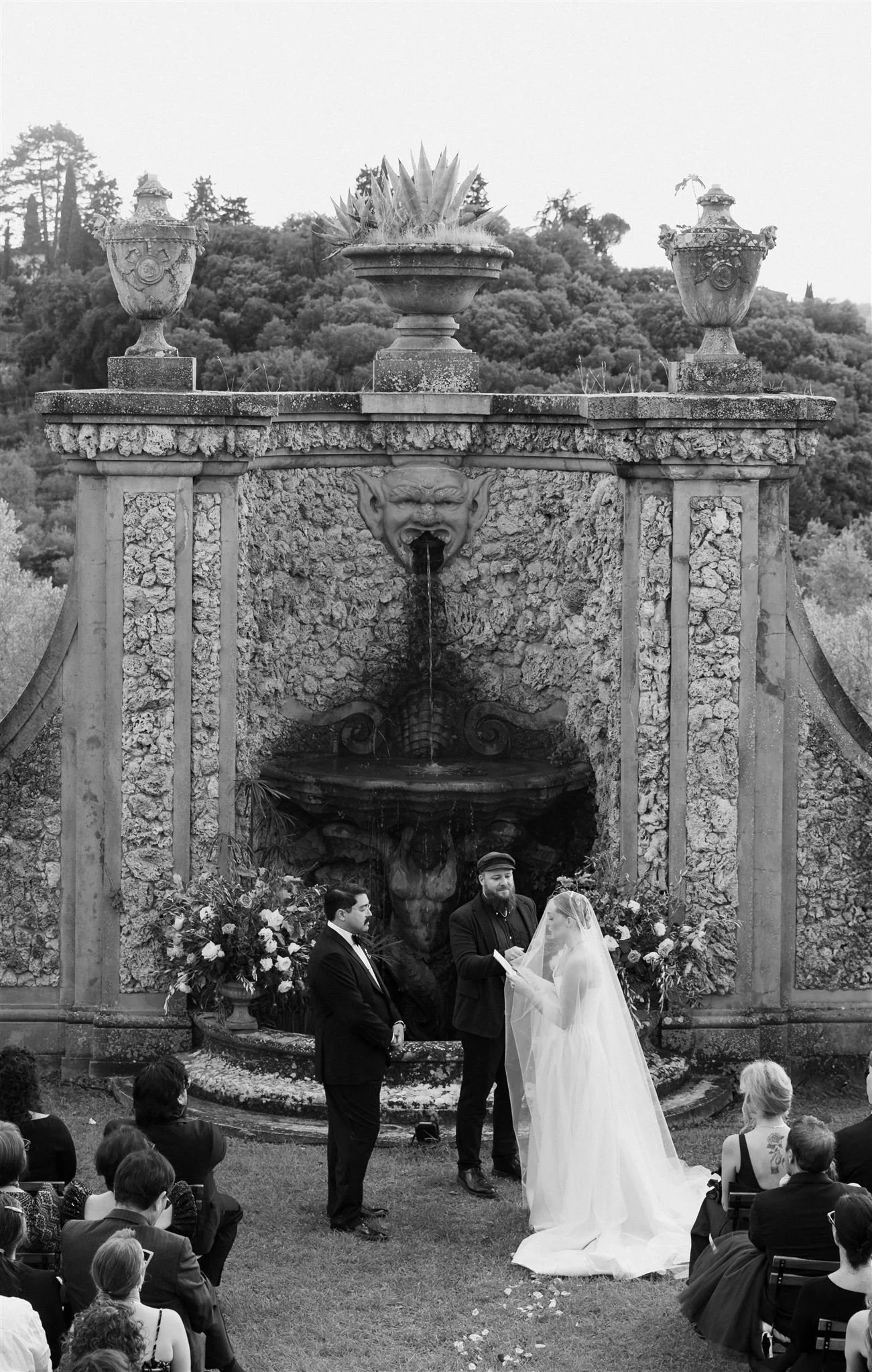 Garden Wedding Ceremony on a wedding day at Villa Medicea Di Lilliano in Tuscany, Italy.