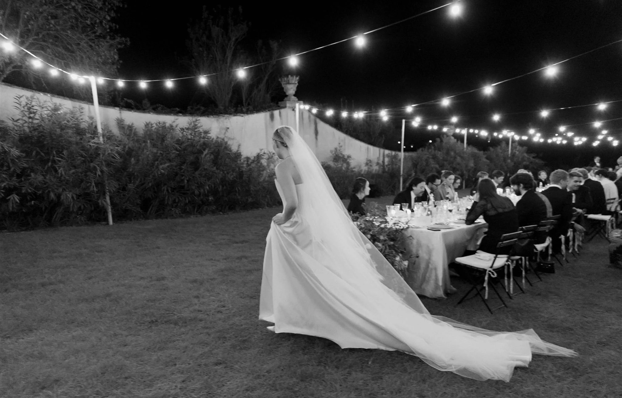 Garden wedding reception on a wedding day at Villa Medicea Di Lilliano in Tuscany, Italy.