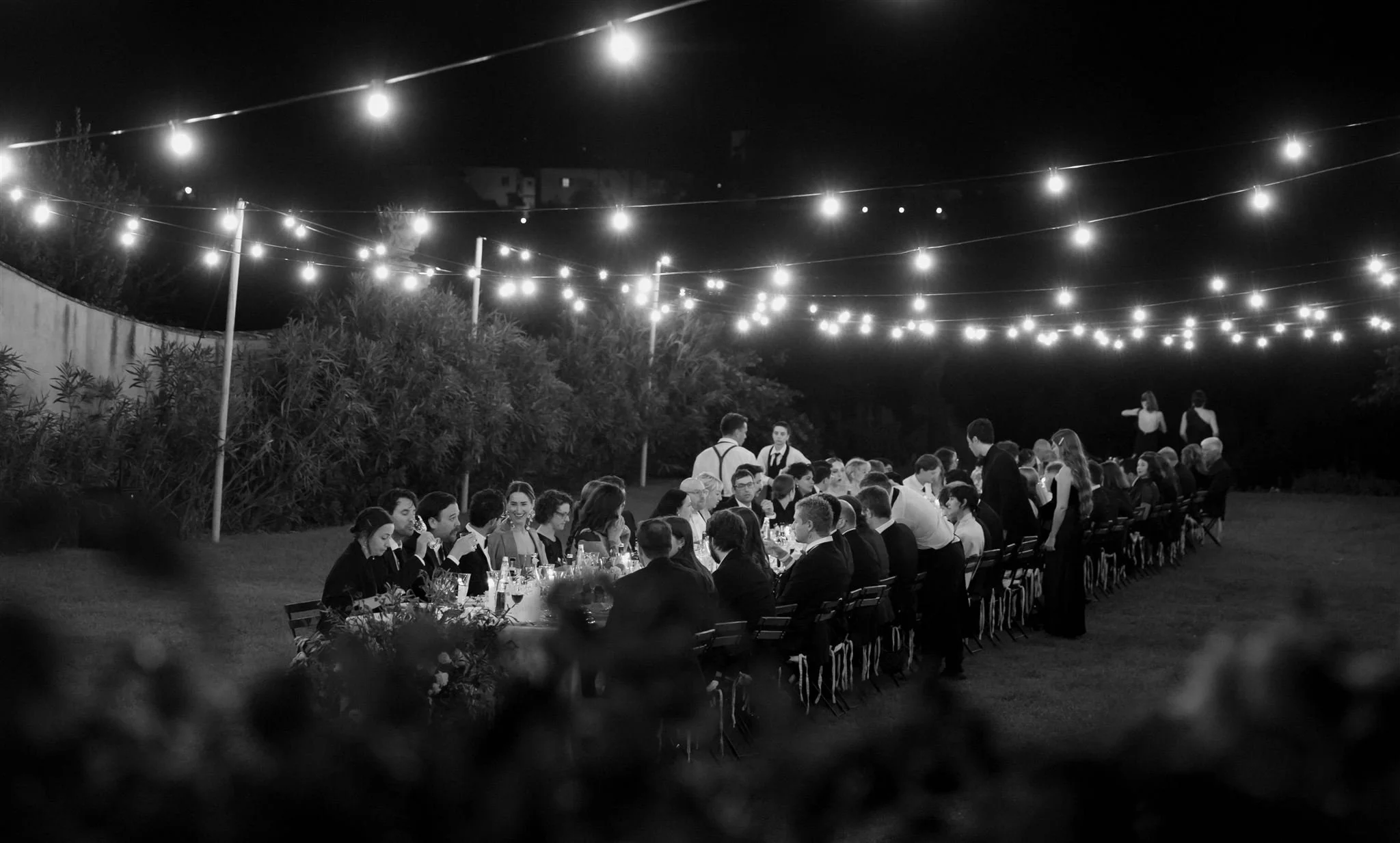 Garden wedding reception on a wedding day at Villa Medicea Di Lilliano in Tuscany, Italy.
