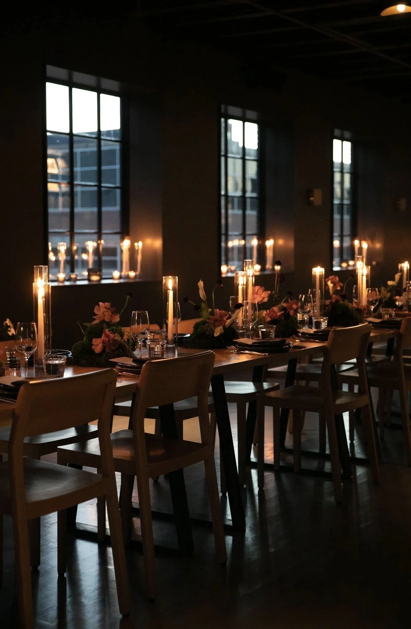 Candlelit rehearsal dinner at Maxwells Trading Chicago wedding venue.