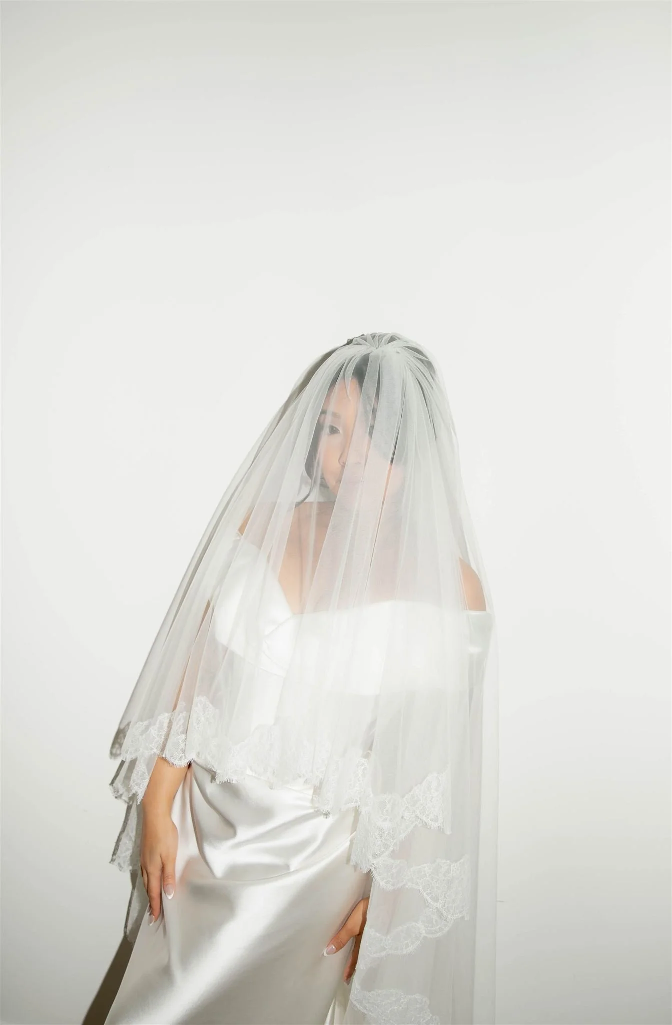 An editorial bridal portrait on her wedding day in Chicago.