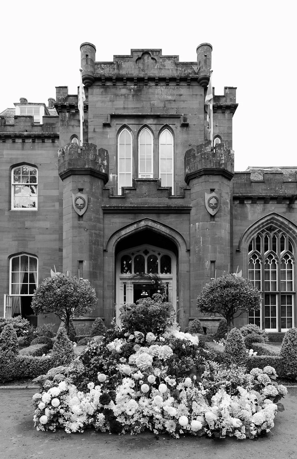 A luxury castle bride on a wedding day at Drumtochty Castle in Scotland.